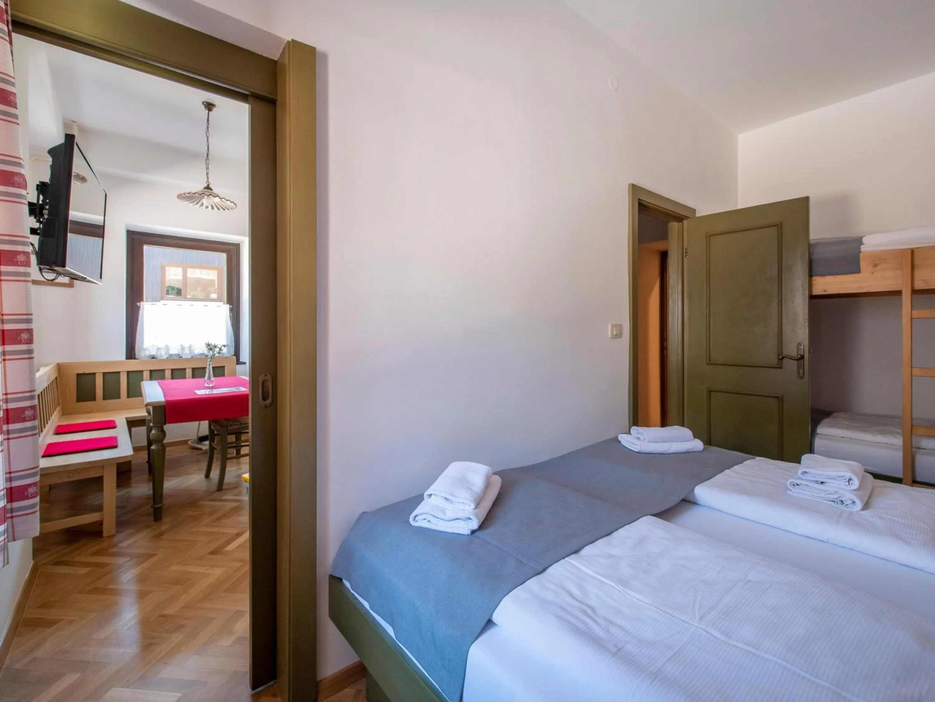 Bed in Berghi Hotel and Apartments