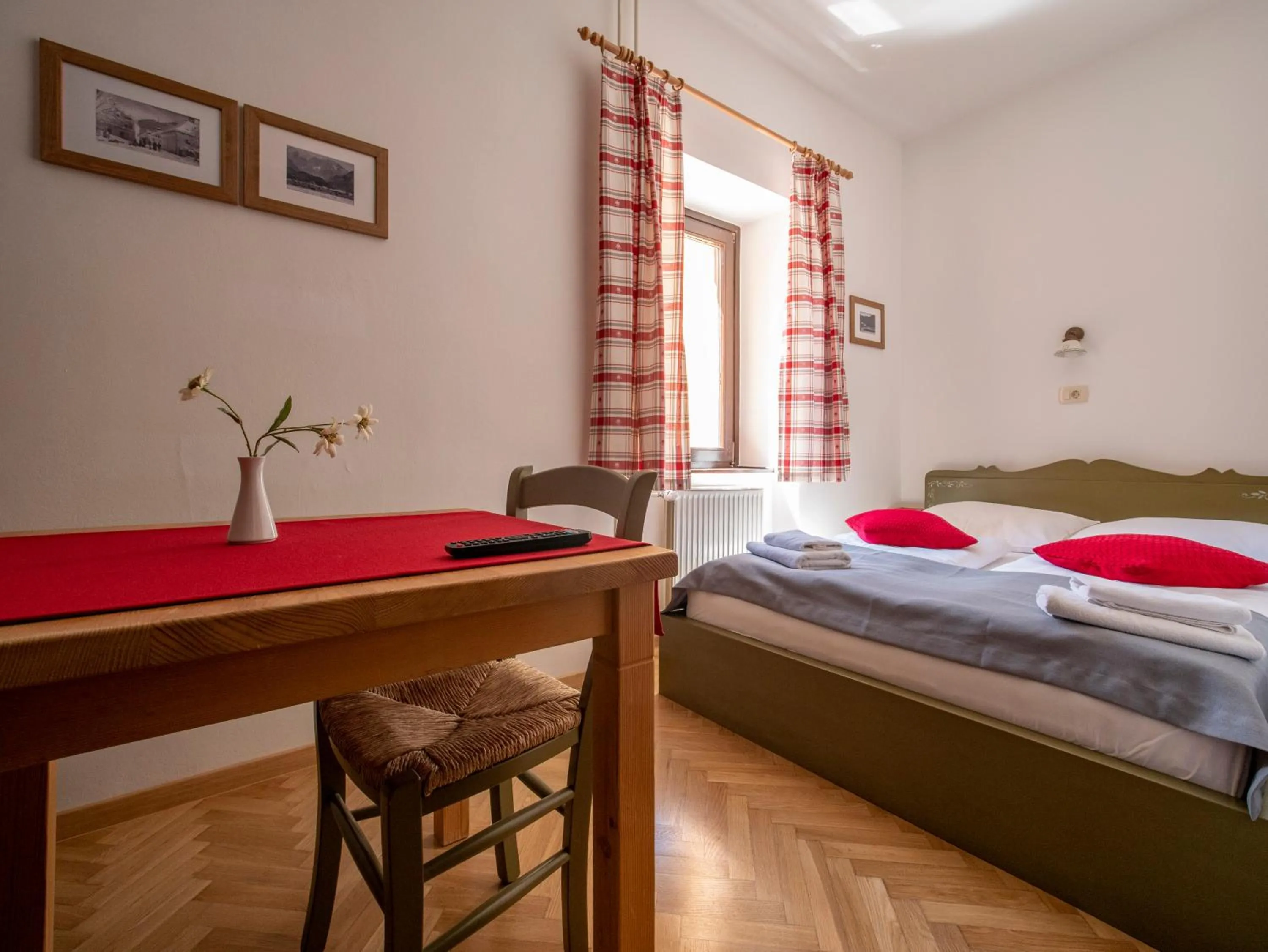 Bed in Berghi Hotel and Apartments