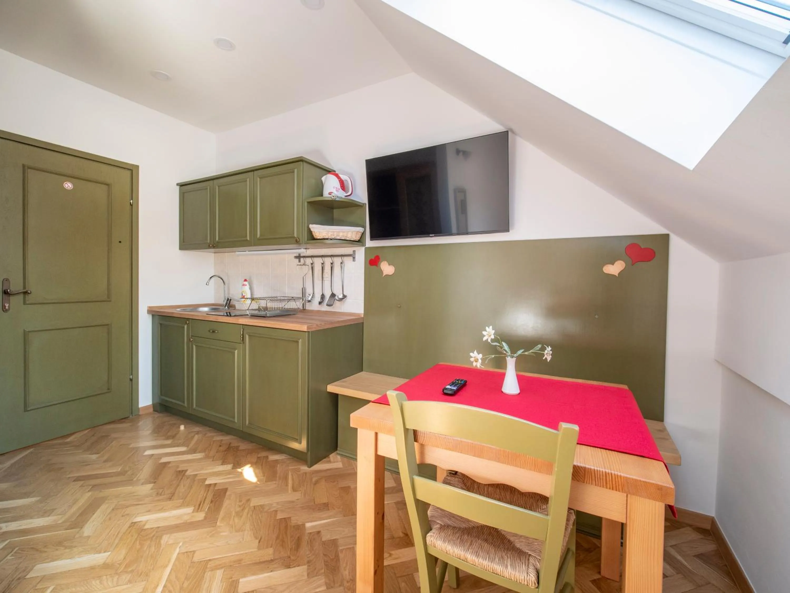 Kitchen or kitchenette in Berghi Hotel and Apartments