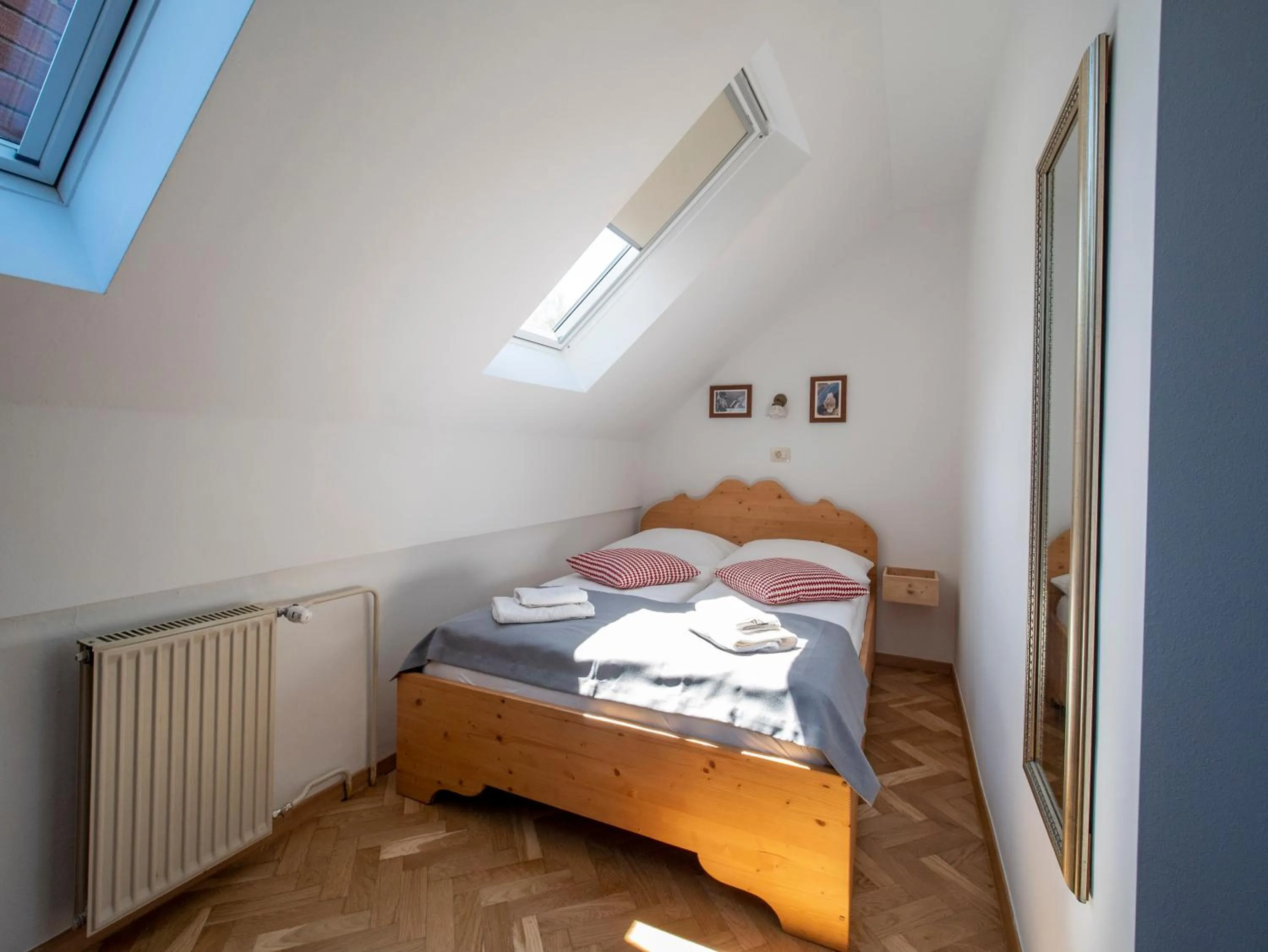 Bed in Berghi Hotel and Apartments