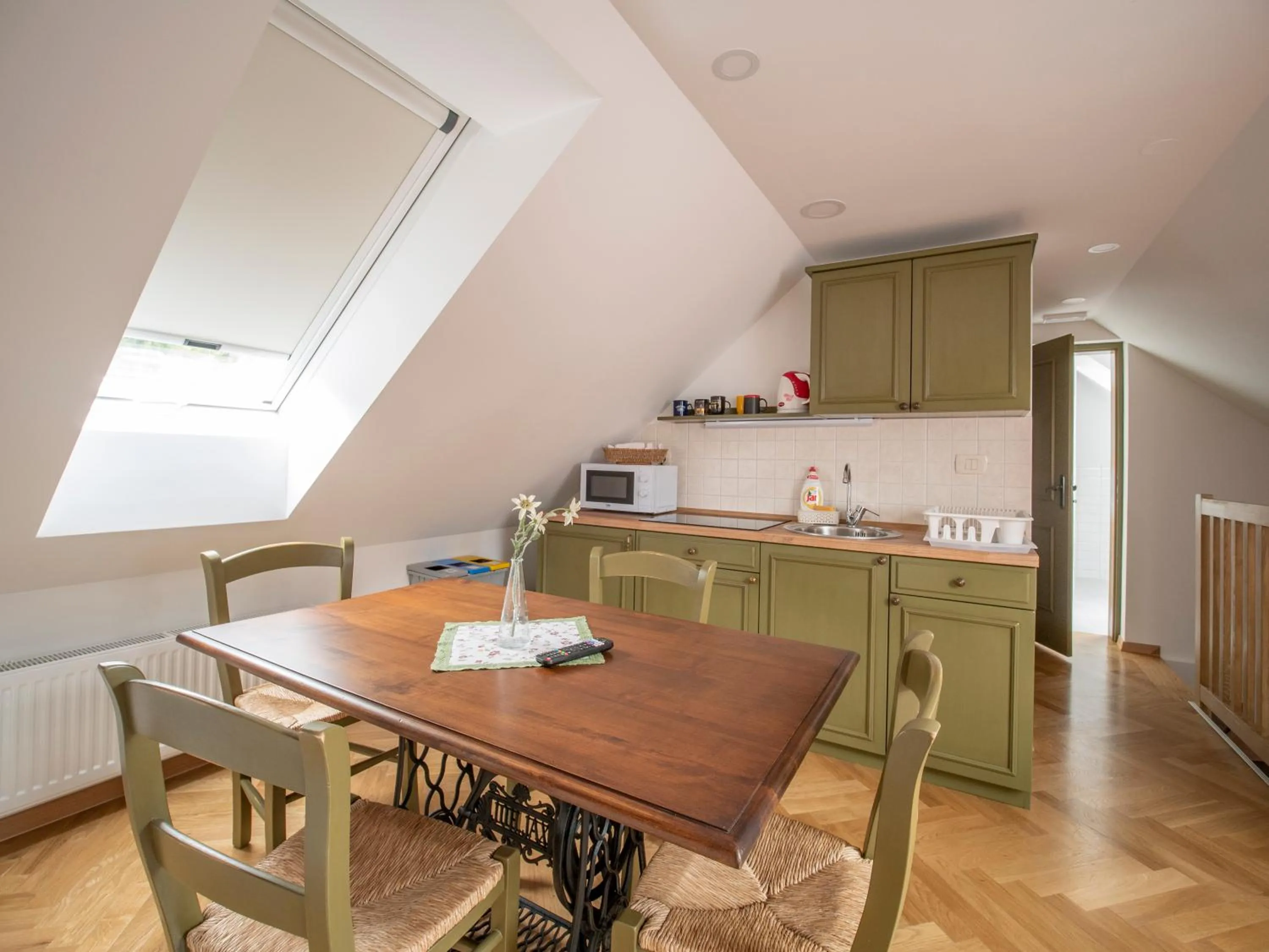 Kitchen or kitchenette in Berghi Hotel and Apartments