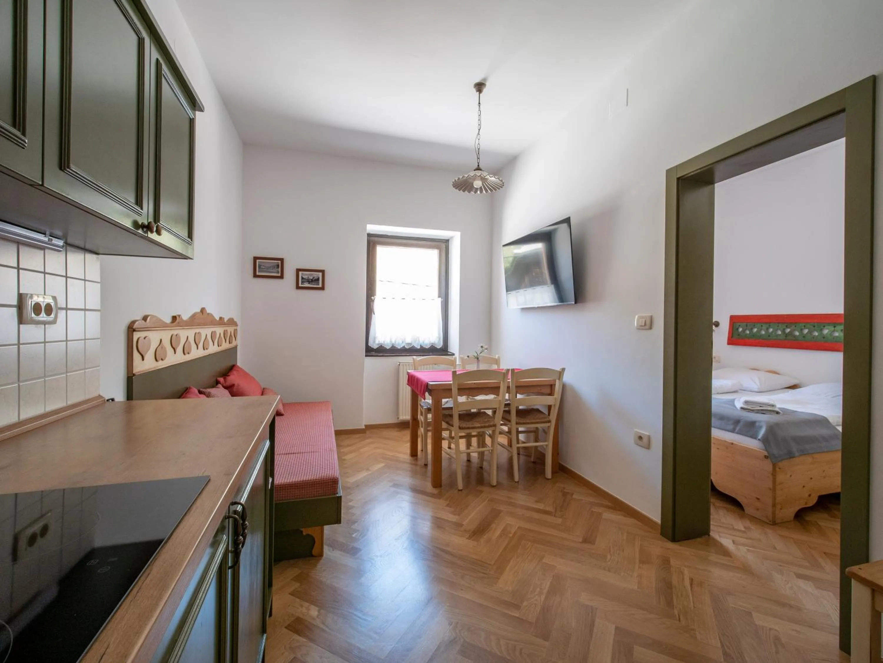 Kitchen or kitchenette in Berghi Hotel and Apartments