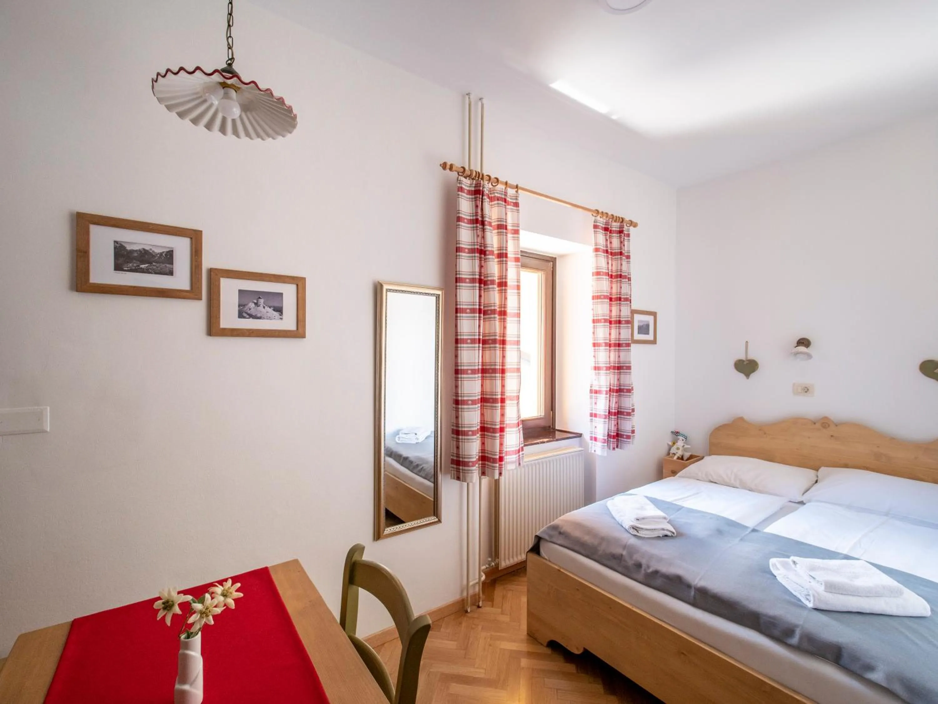 Bed in Berghi Hotel and Apartments