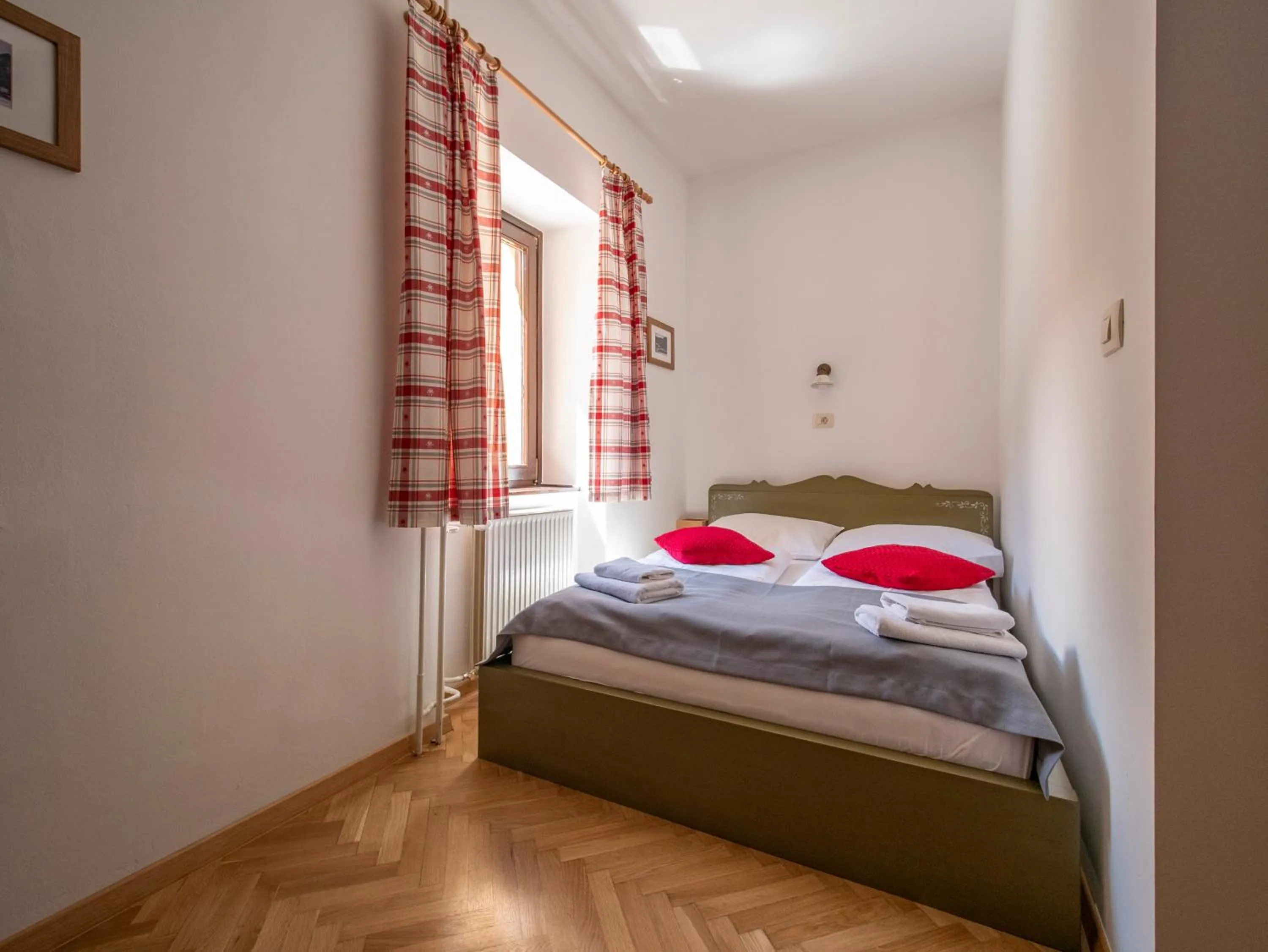 Bed in Berghi Hotel and Apartments