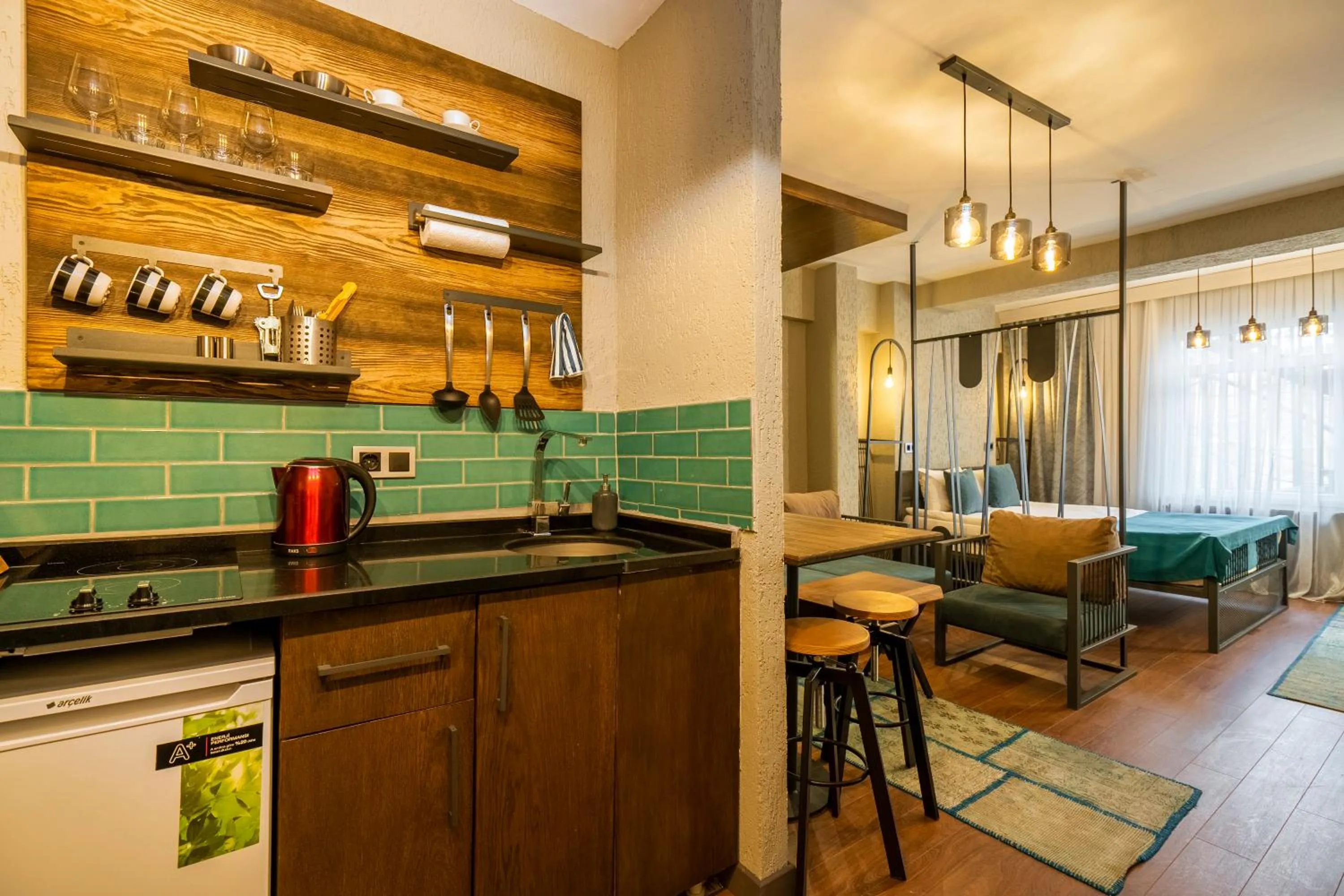 Kitchen or kitchenette in Cube Suites