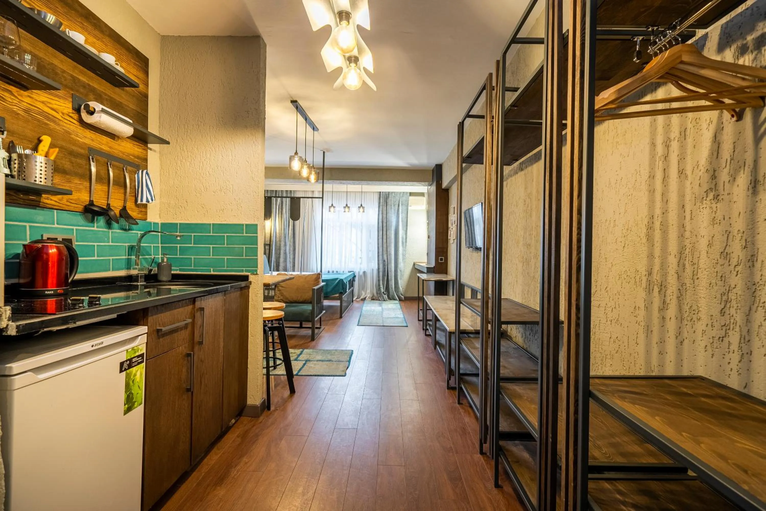 Kitchen or kitchenette in Cube Suites