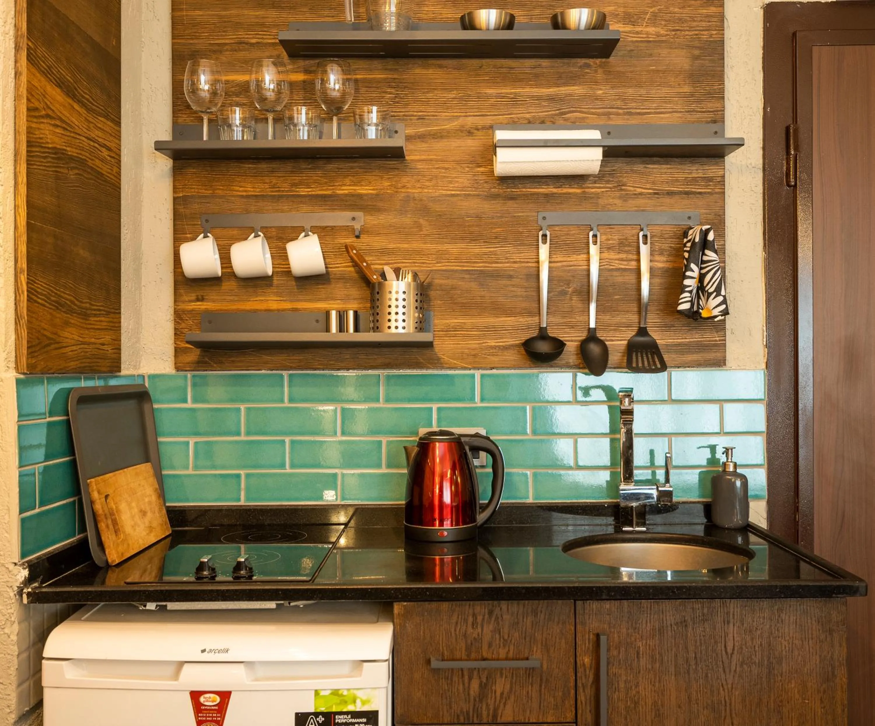 Kitchen or kitchenette in Cube Suites