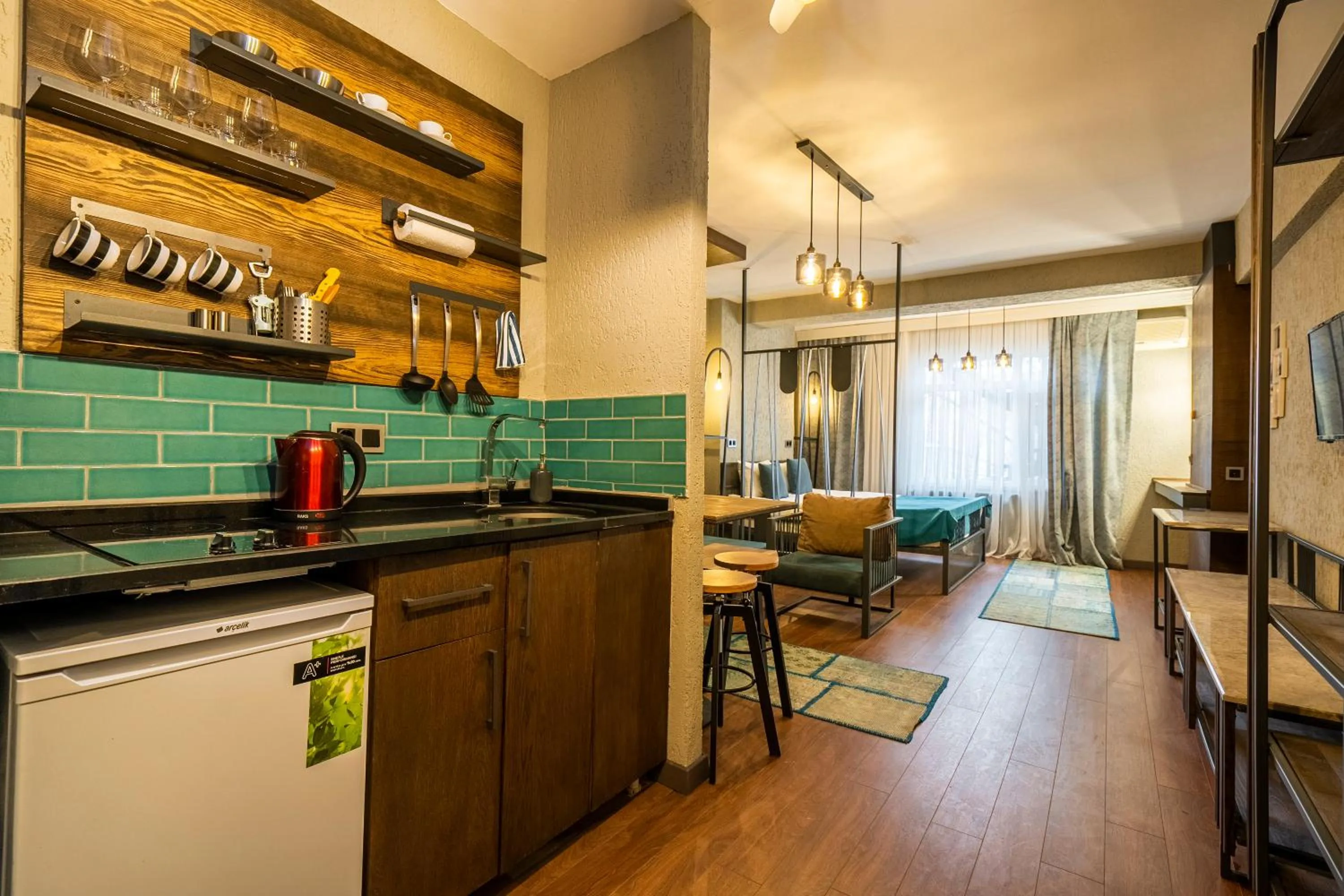 Kitchen or kitchenette in Cube Suites