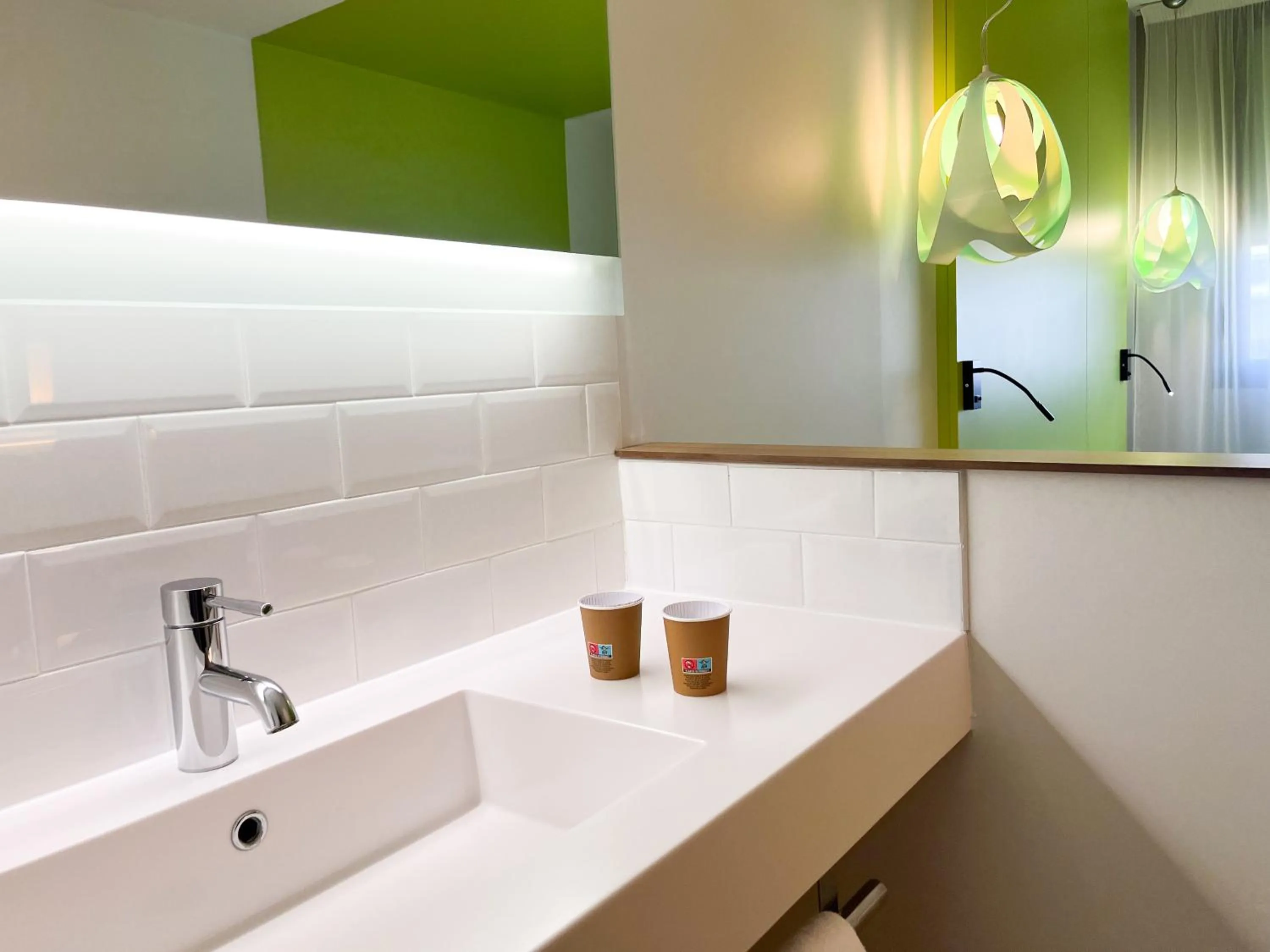 Bathroom in ibis Styles Nimes Gare Centre