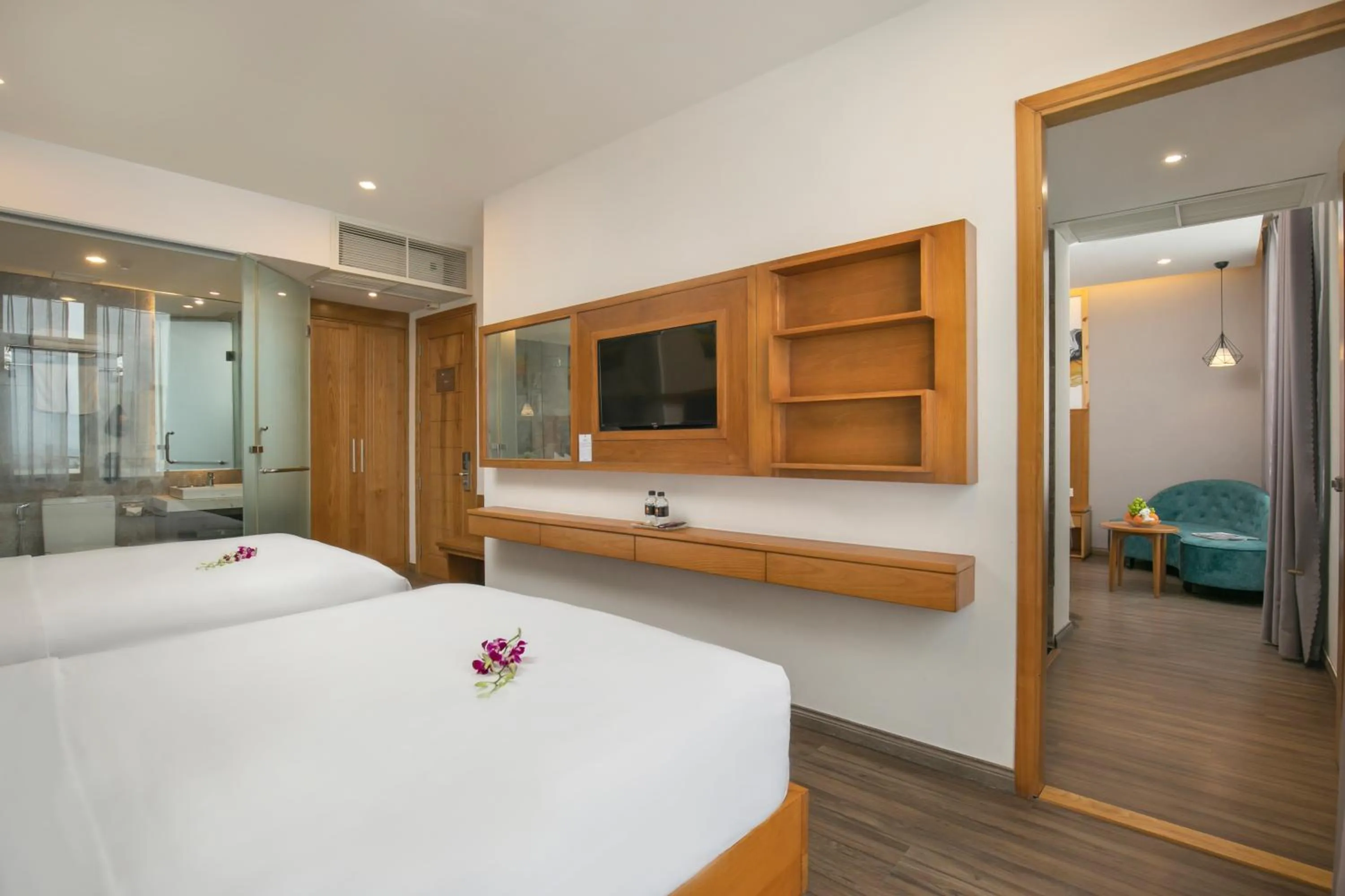 Bed in Grand Sunrise Boutique Hotel