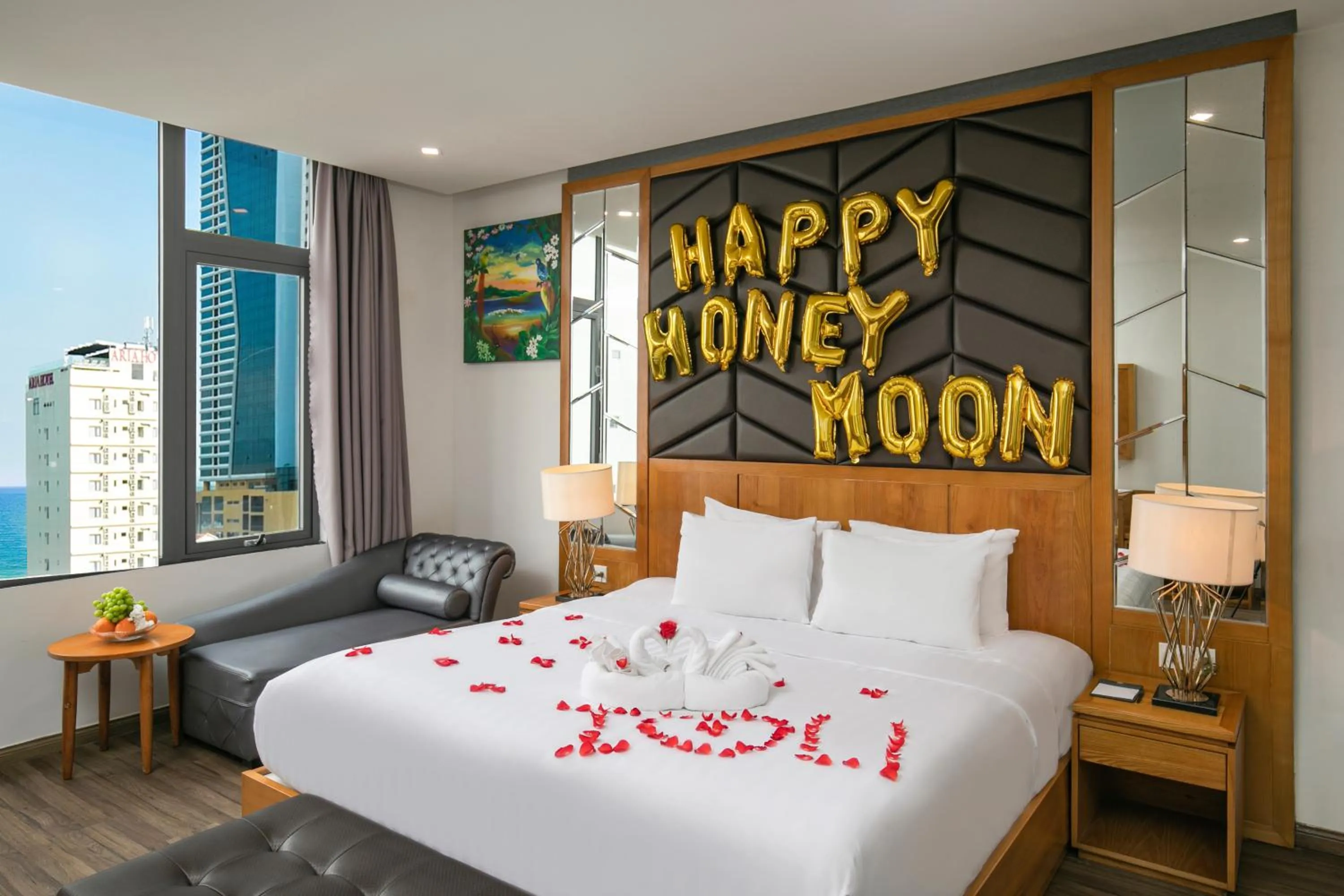 Bed in Grand Sunrise Boutique Hotel