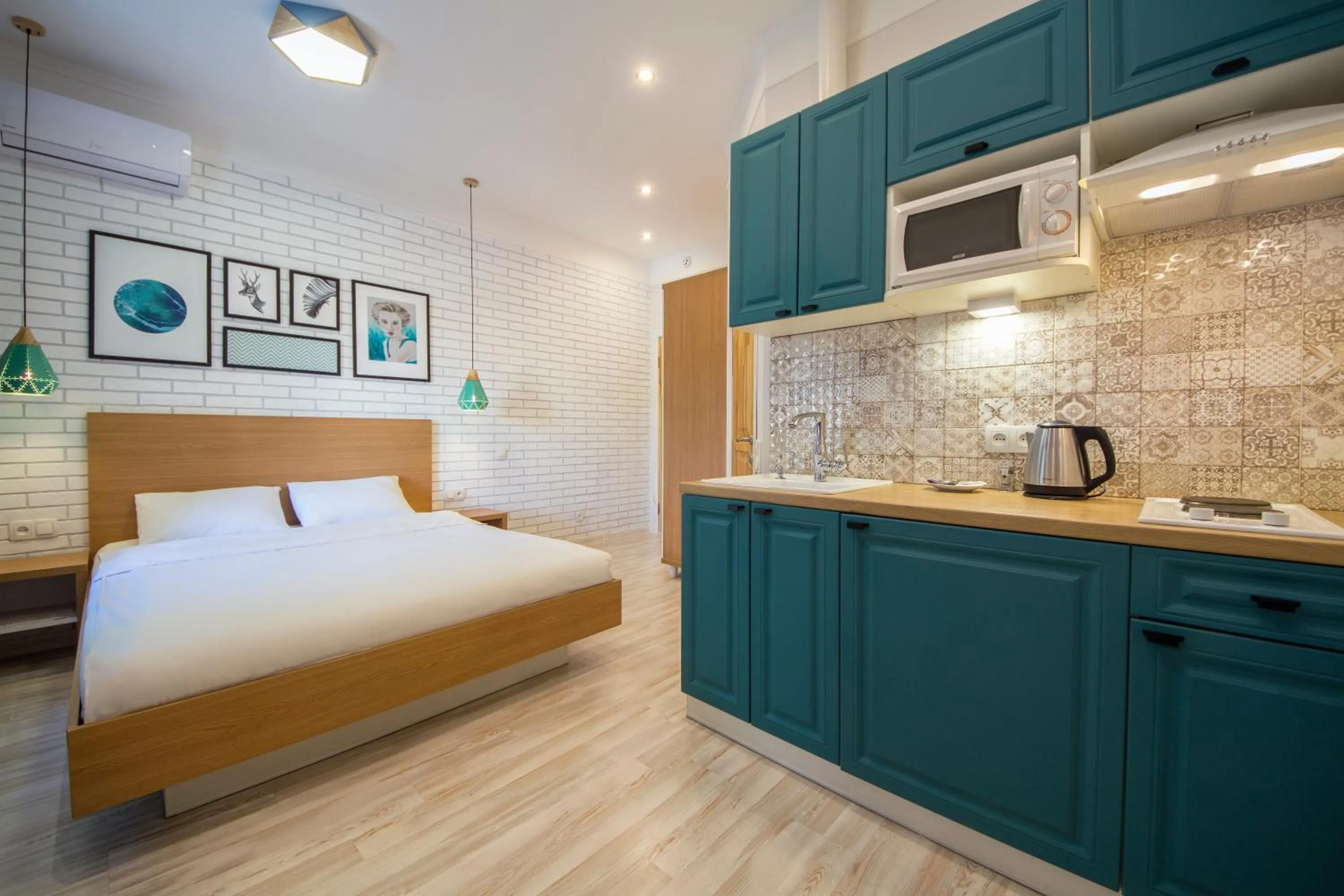 Kitchen or kitchenette, Bed in Idea Design Apart-Hotel