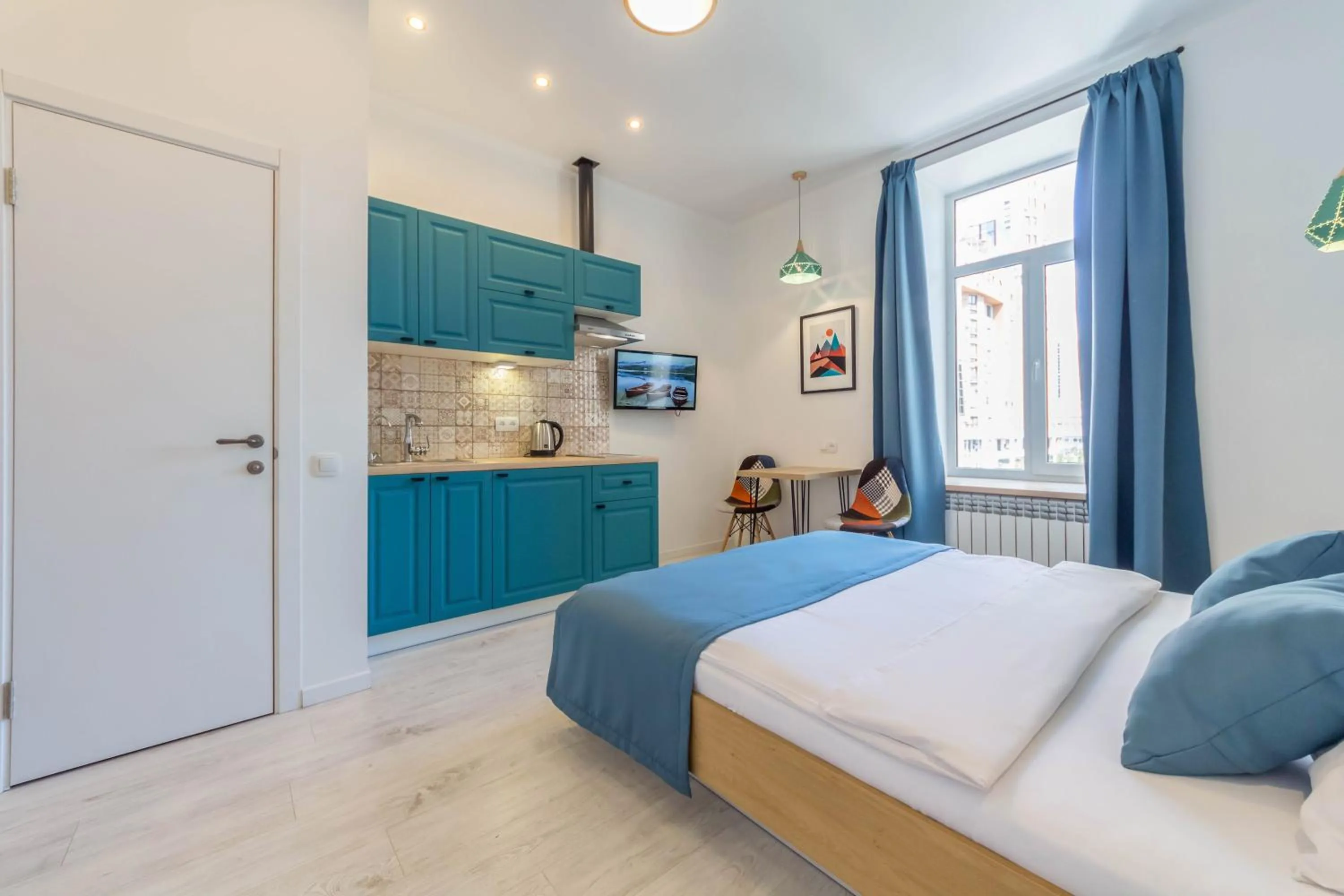 Bed in Idea Design Apart-Hotel