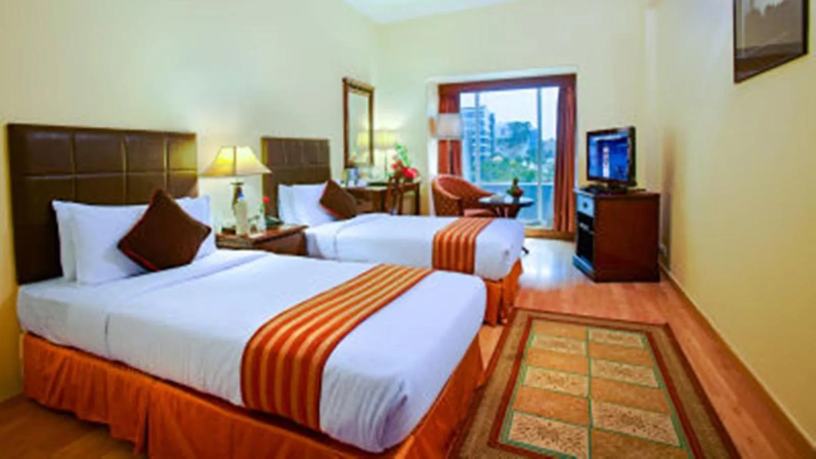 Photo of the whole room, Bed in MGM Mark Whitefield