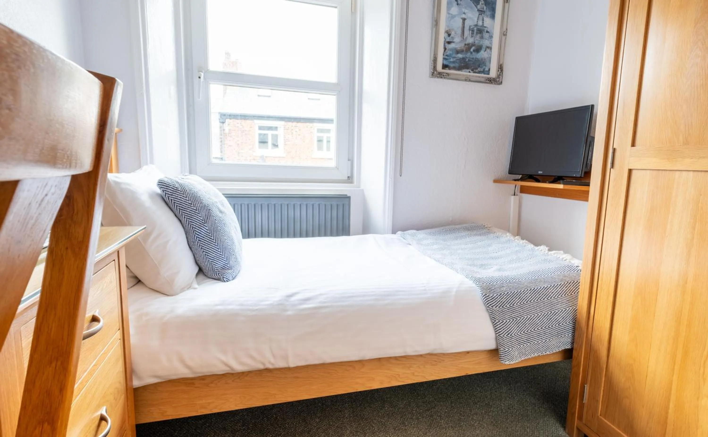 Photo of the whole room, Bed in Number 7 Guest House