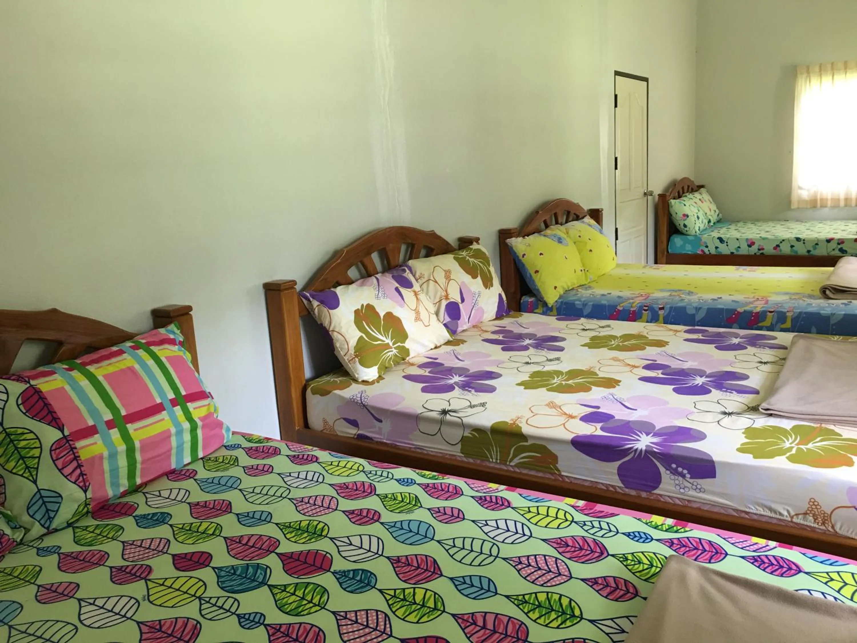 Bed in นาหินลาดรีสอร์ท Nahinlad Resort