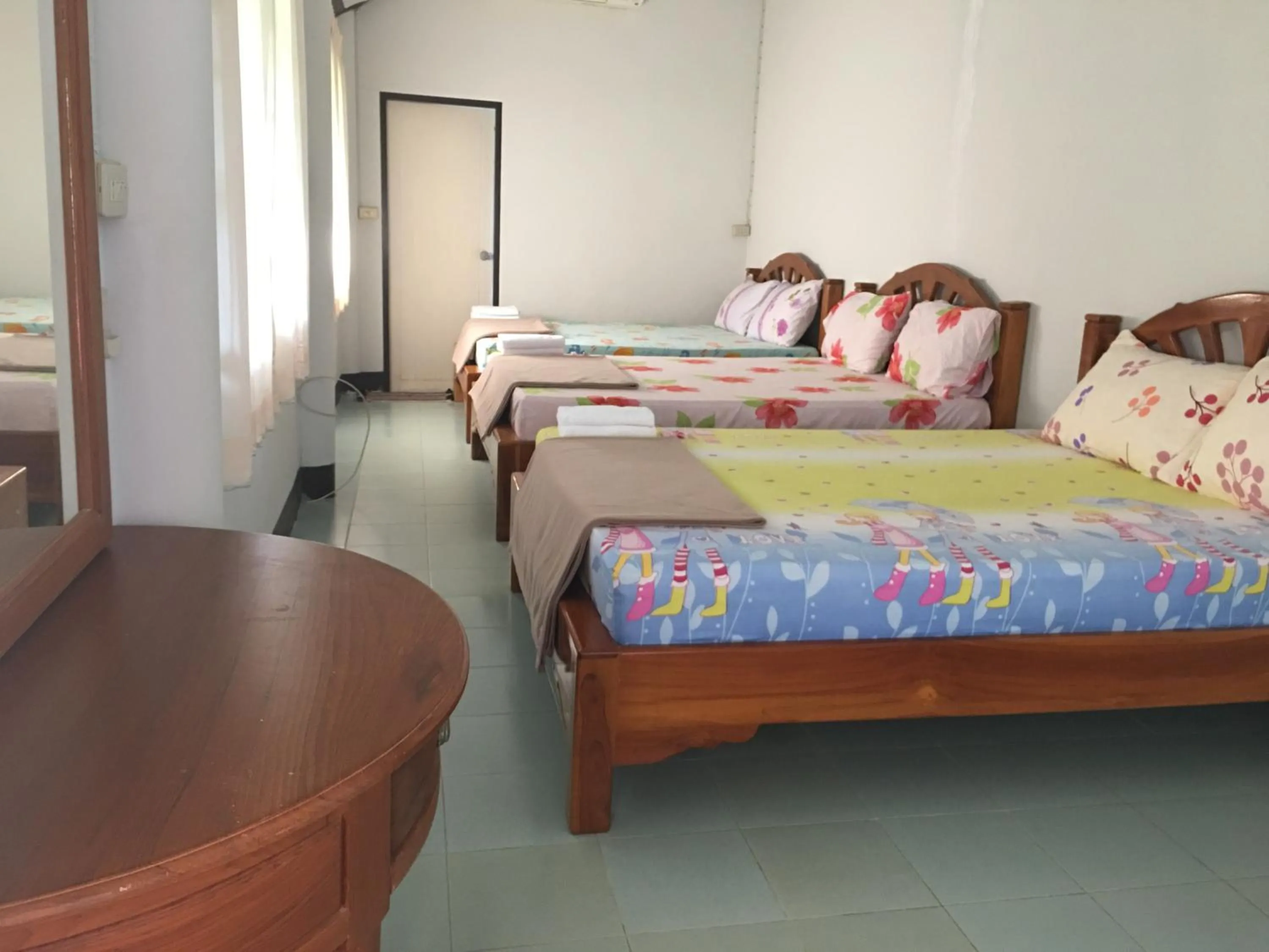 Bed in นาหินลาดรีสอร์ท Nahinlad Resort