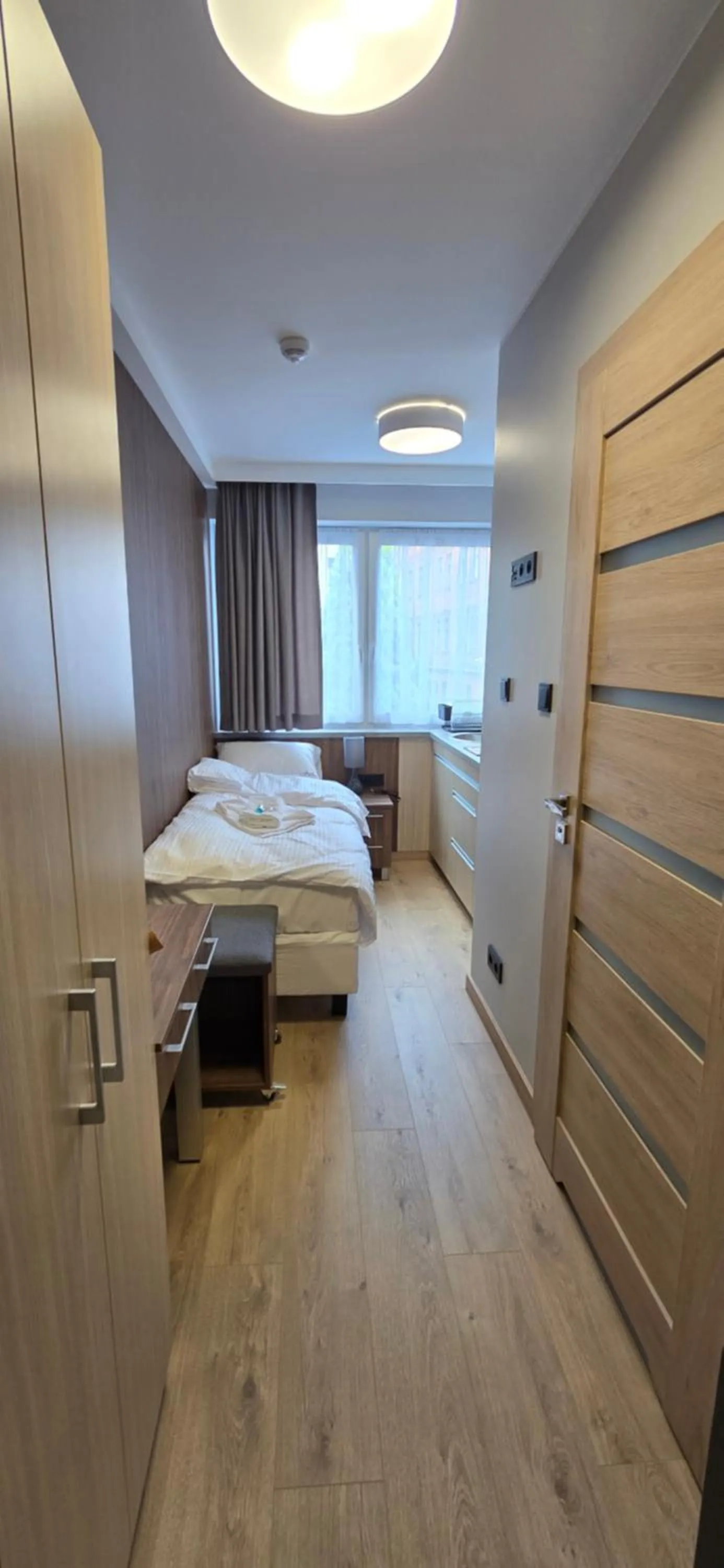 Bed in Metropolis Apartamenty Centrum