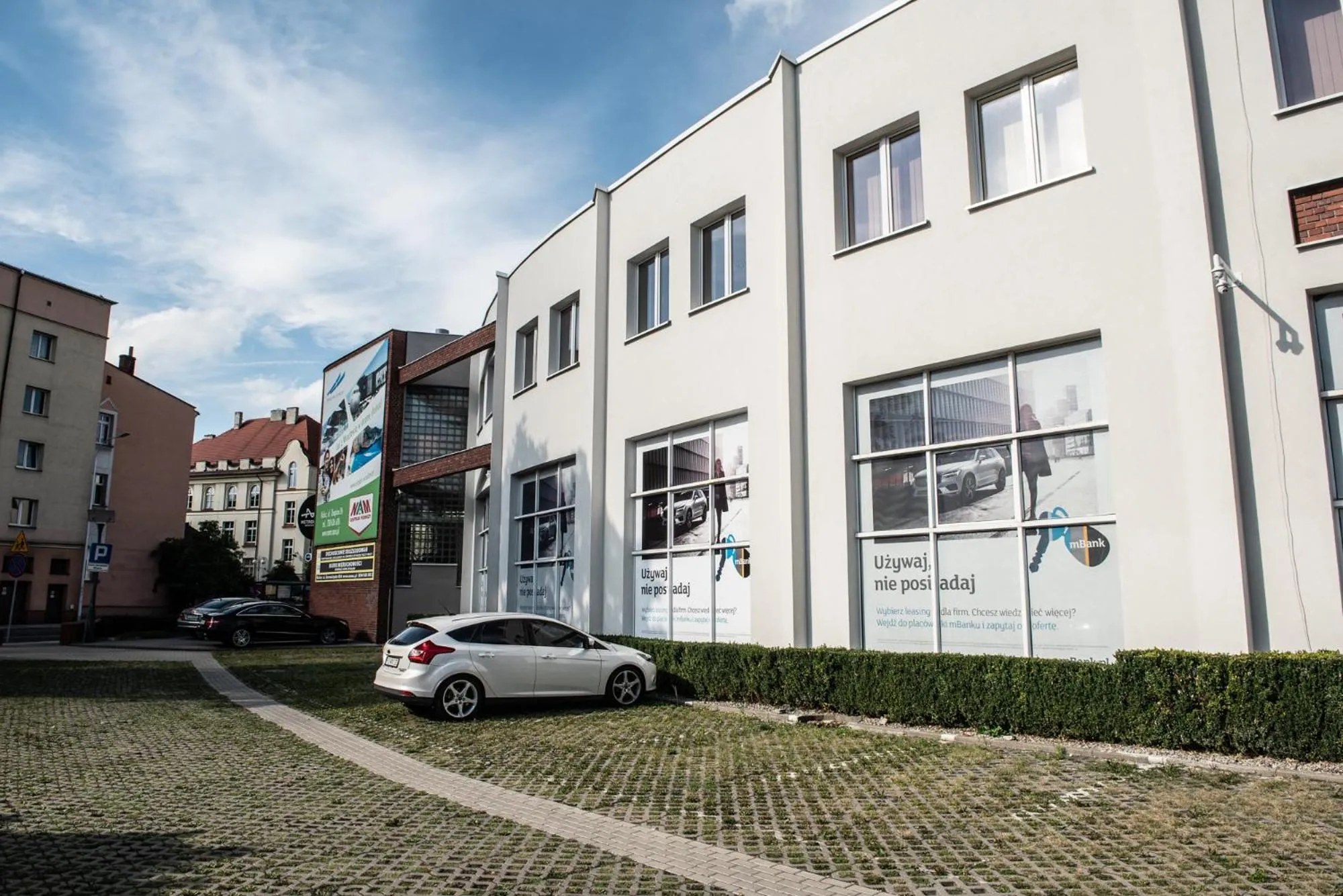 Property building in Metropolis Apartamenty Centrum