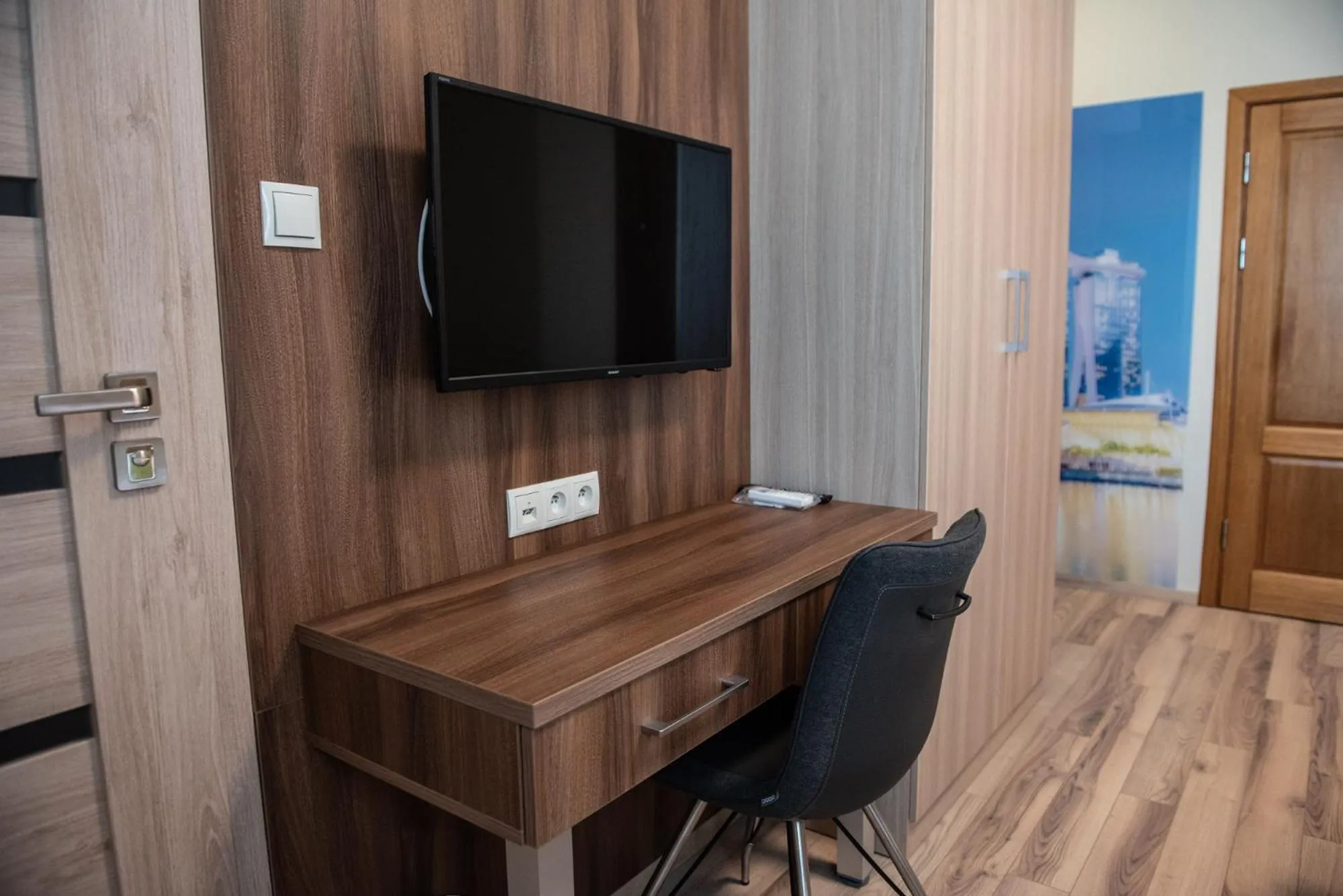 Communal lounge/ TV room in Metropolis Apartamenty Centrum