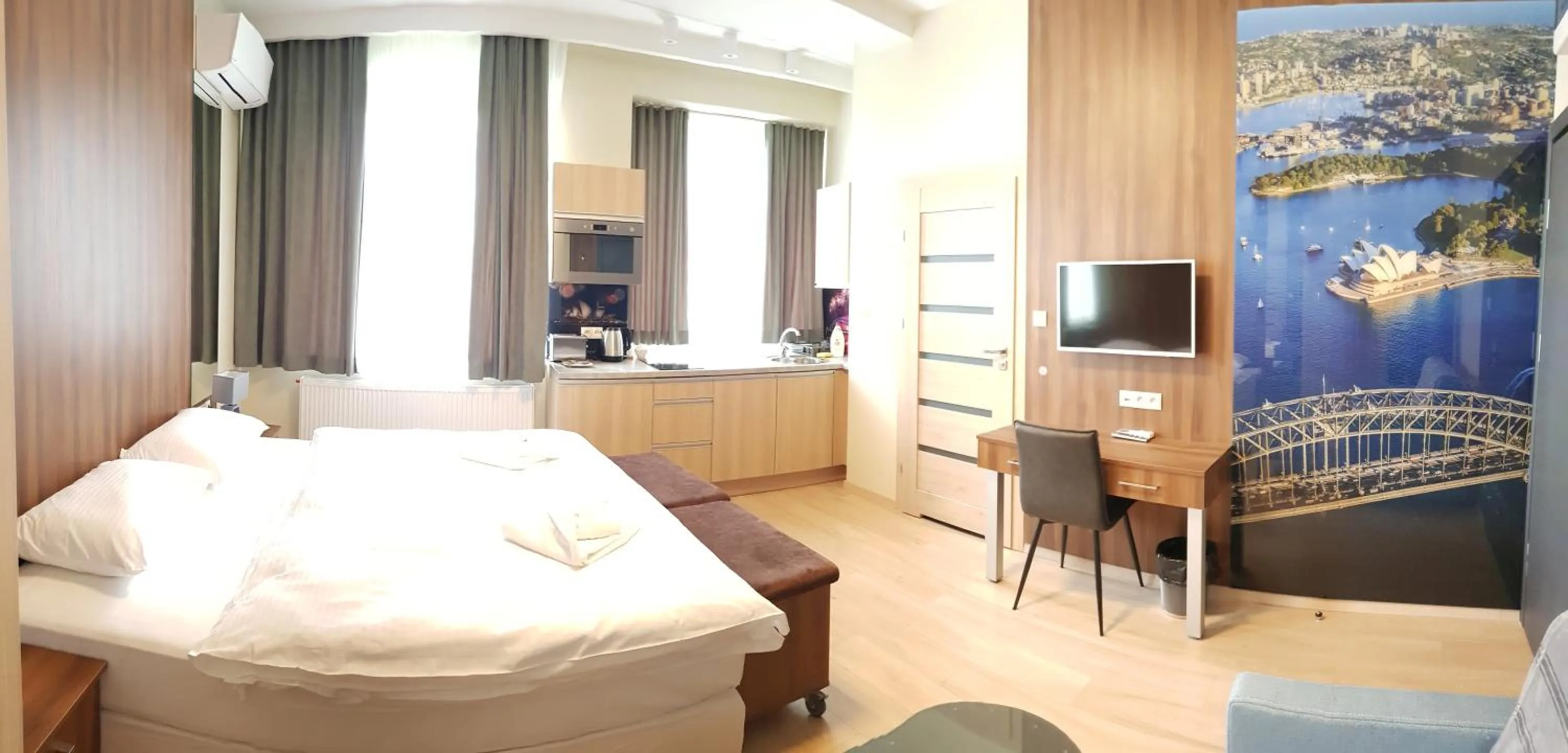 Kitchen or kitchenette, Bed in Metropolis Apartamenty Centrum