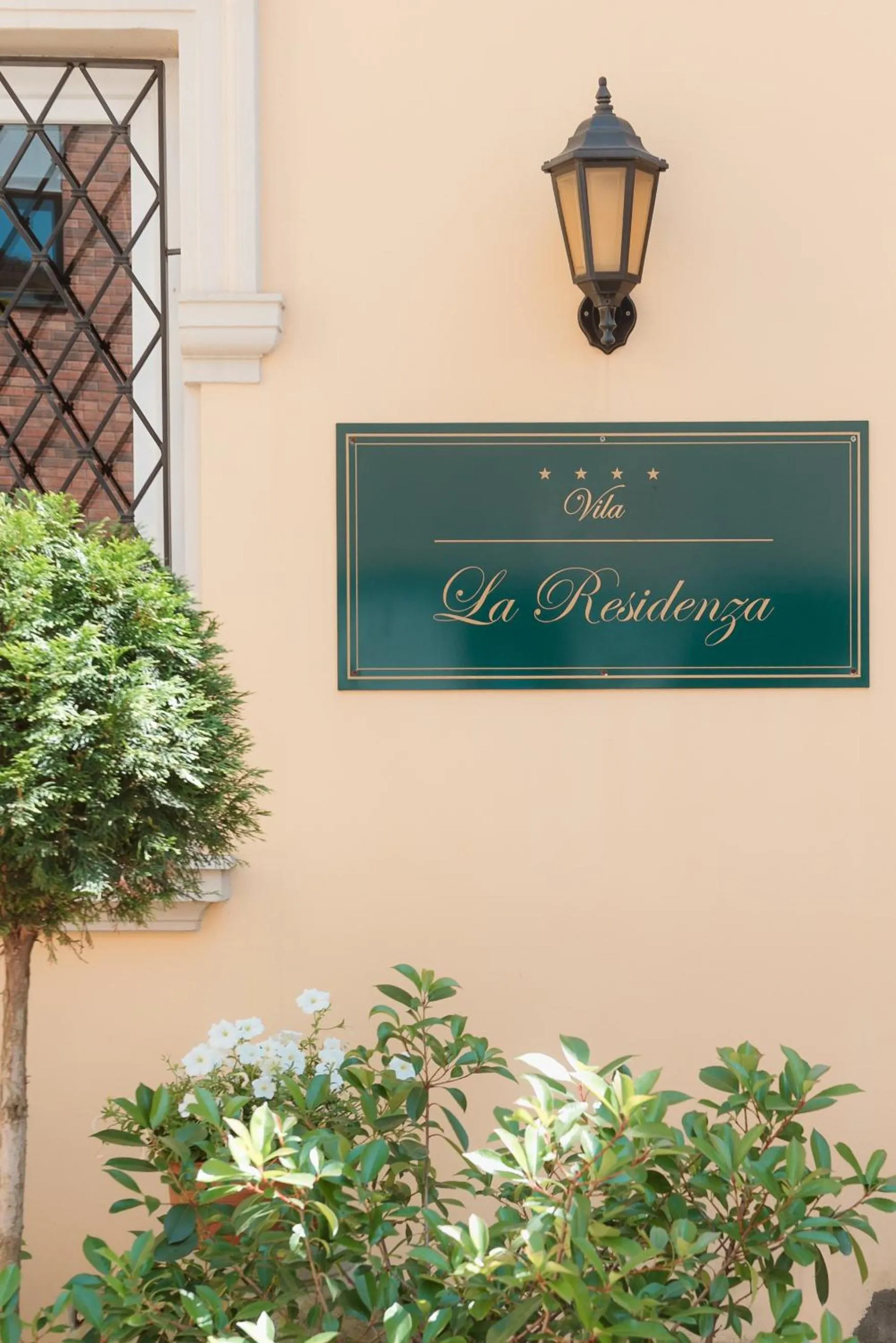 Property logo or sign in Hotel La Residenza