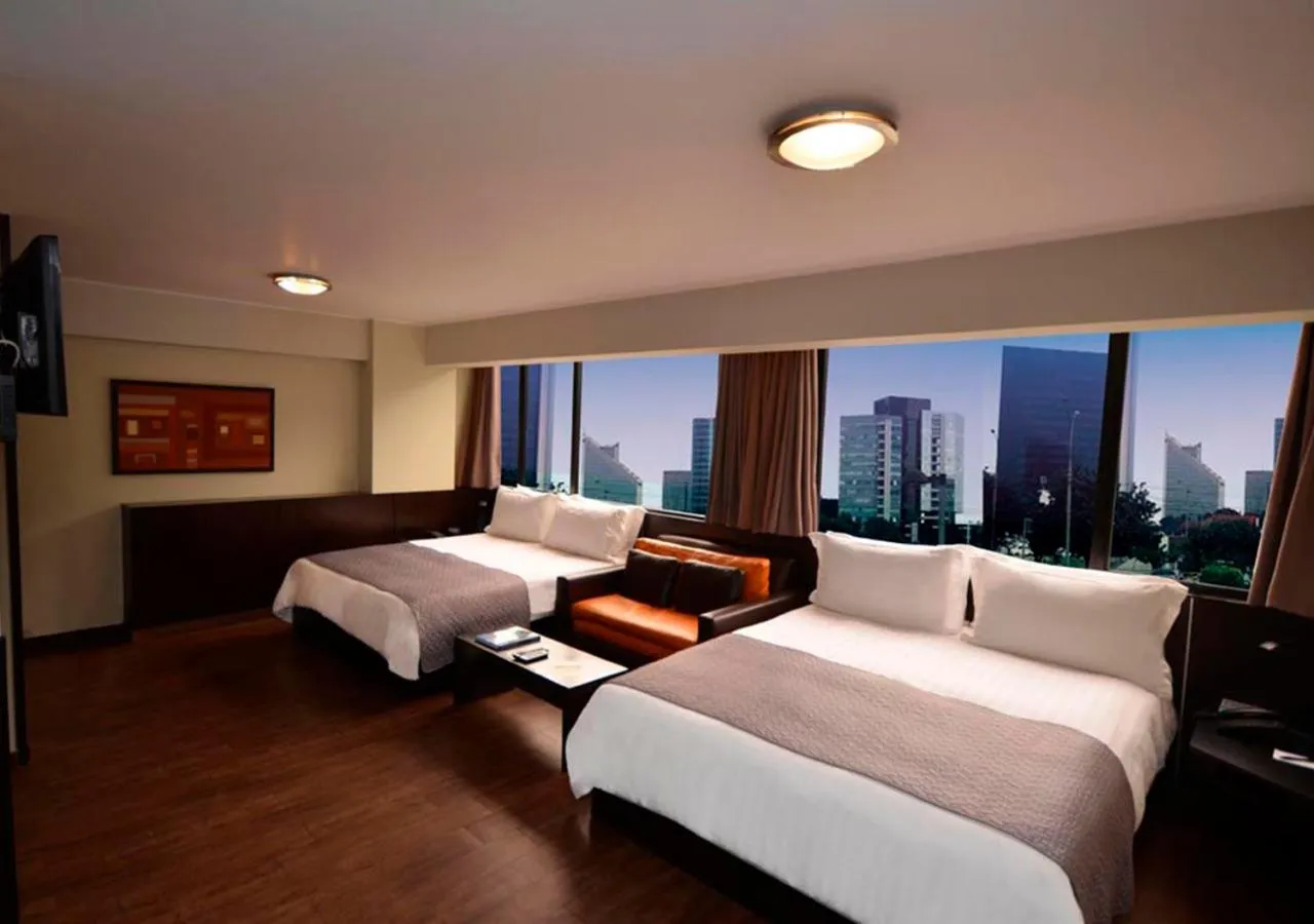Photo of the whole room, Bed in qp Hotels Lima