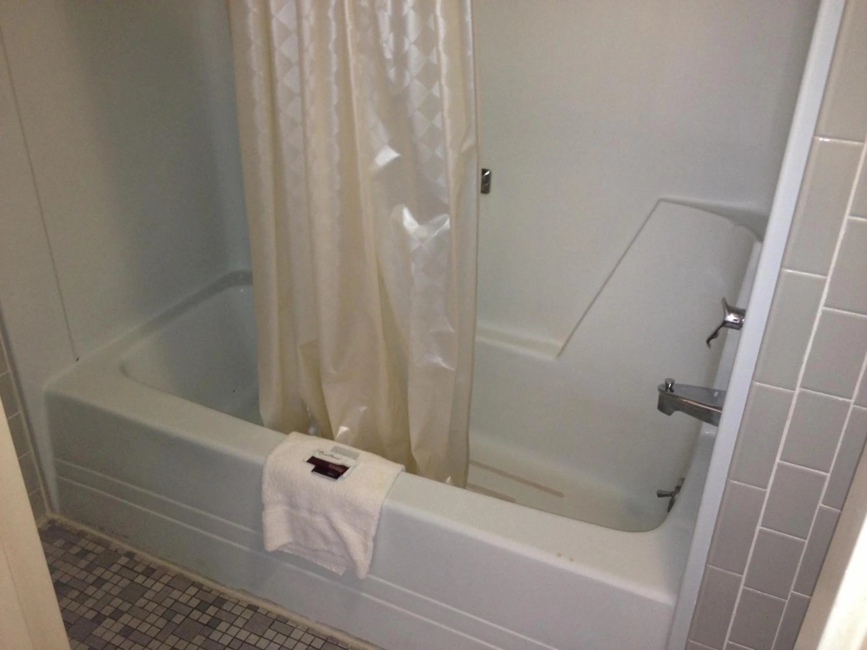 Bathroom in Family Budget Inn Harrison