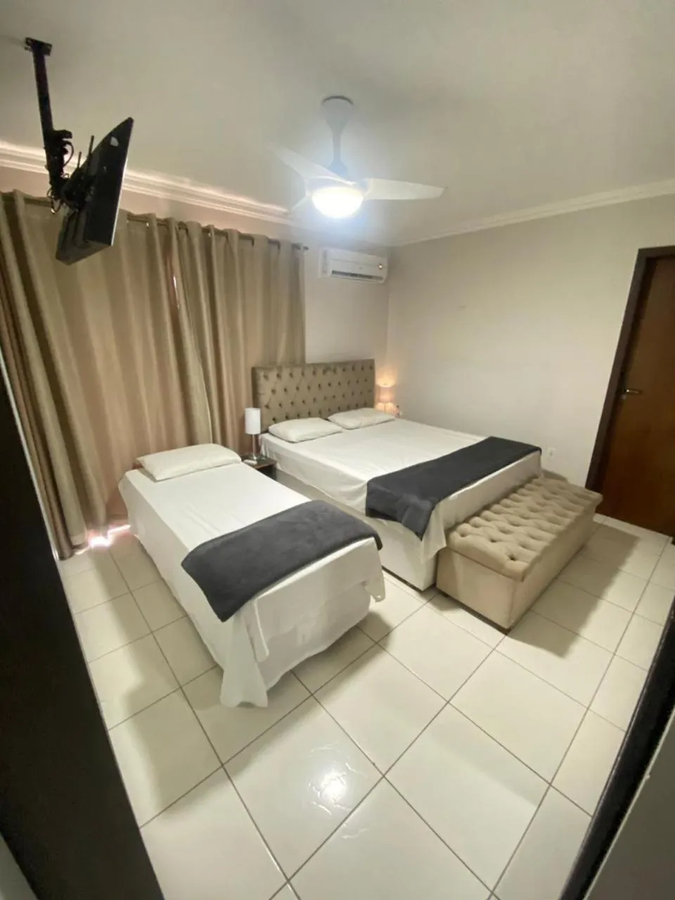 Bed in Rezende Suítes