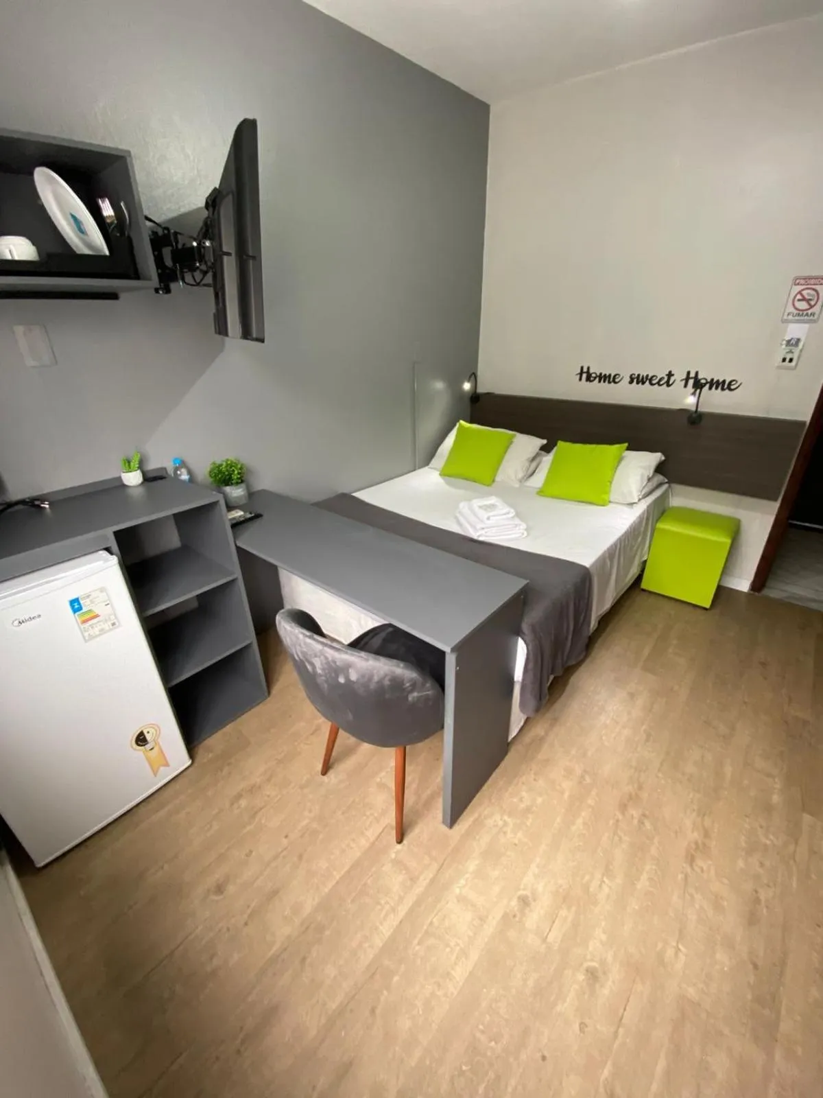 Bed in Rezende Suítes