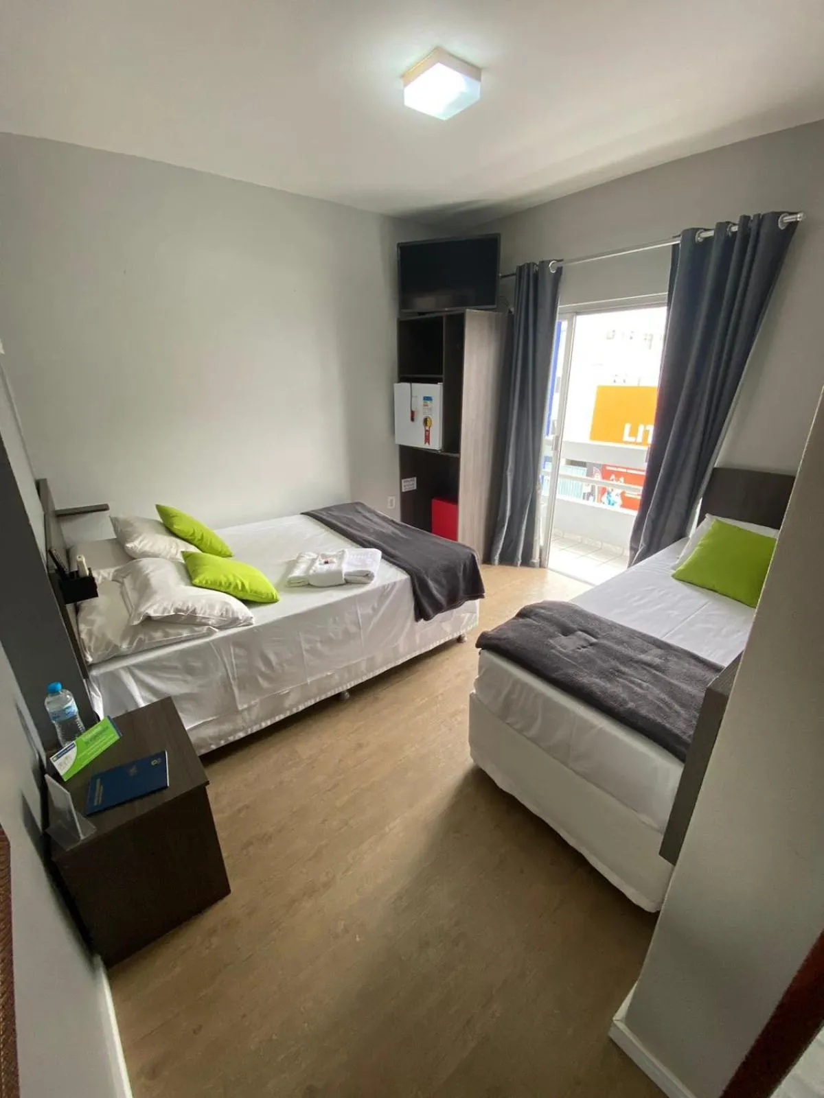 Photo of the whole room, Bed in Rezende Suítes