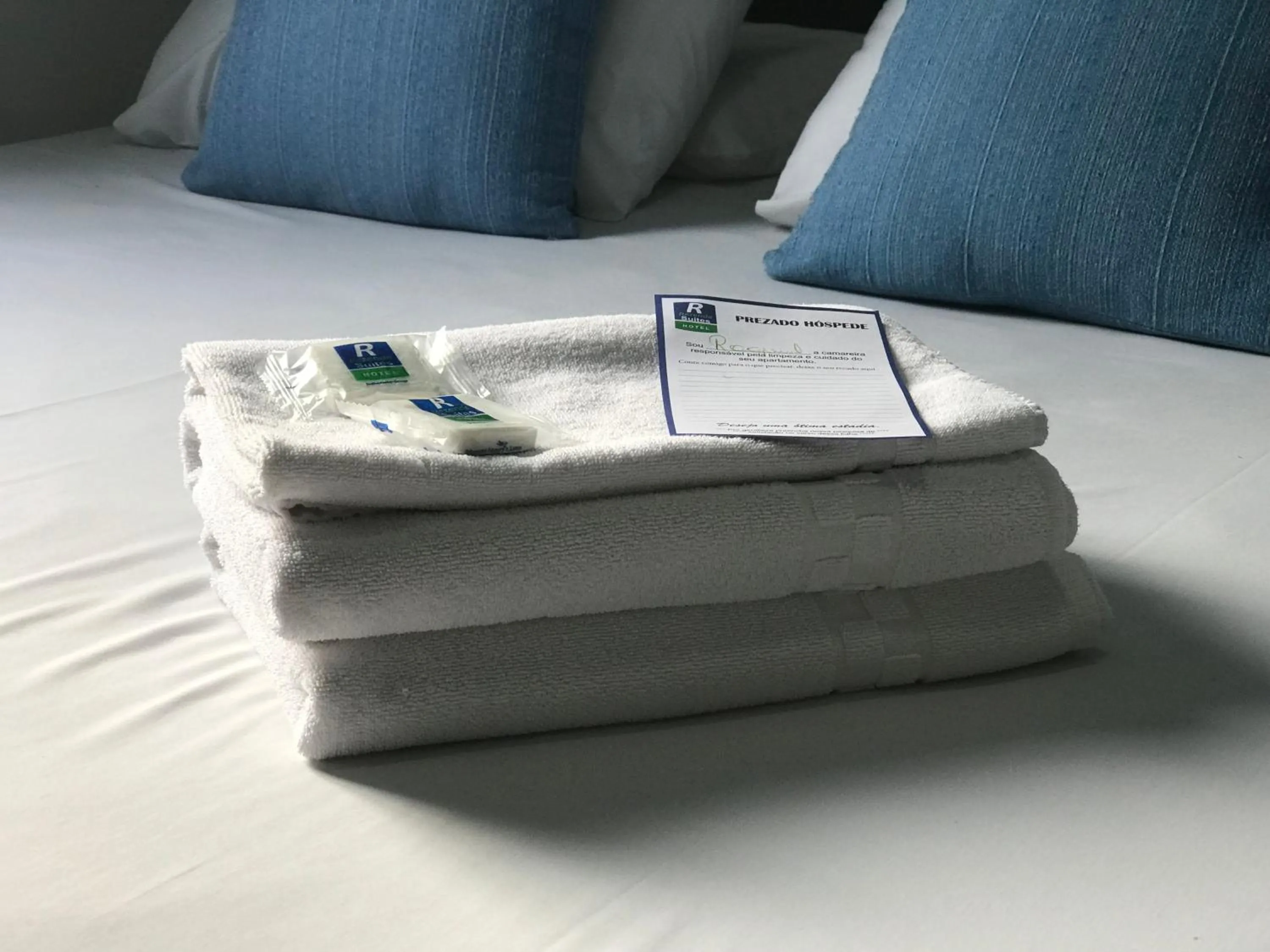 Bed in Rezende Suítes