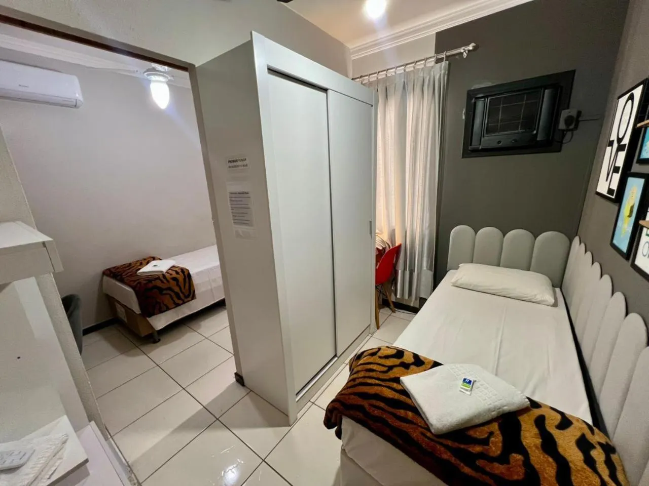 Bed in Rezende Suítes