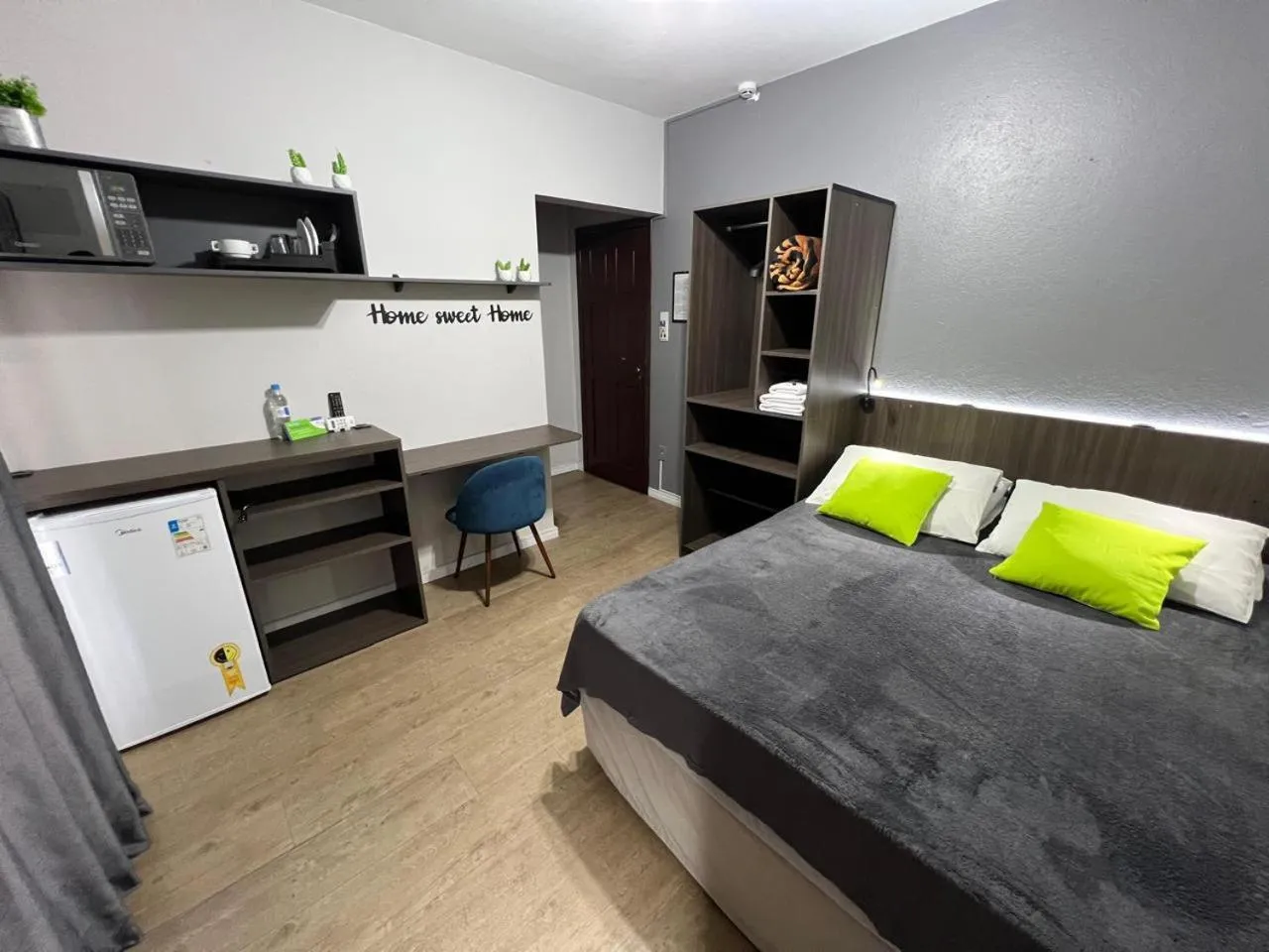 Bed in Rezende Suítes