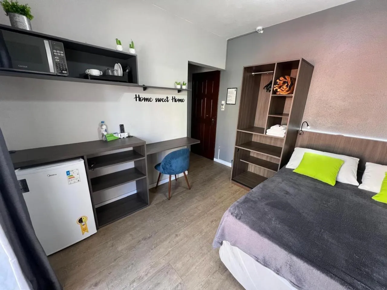 Bed in Rezende Suítes