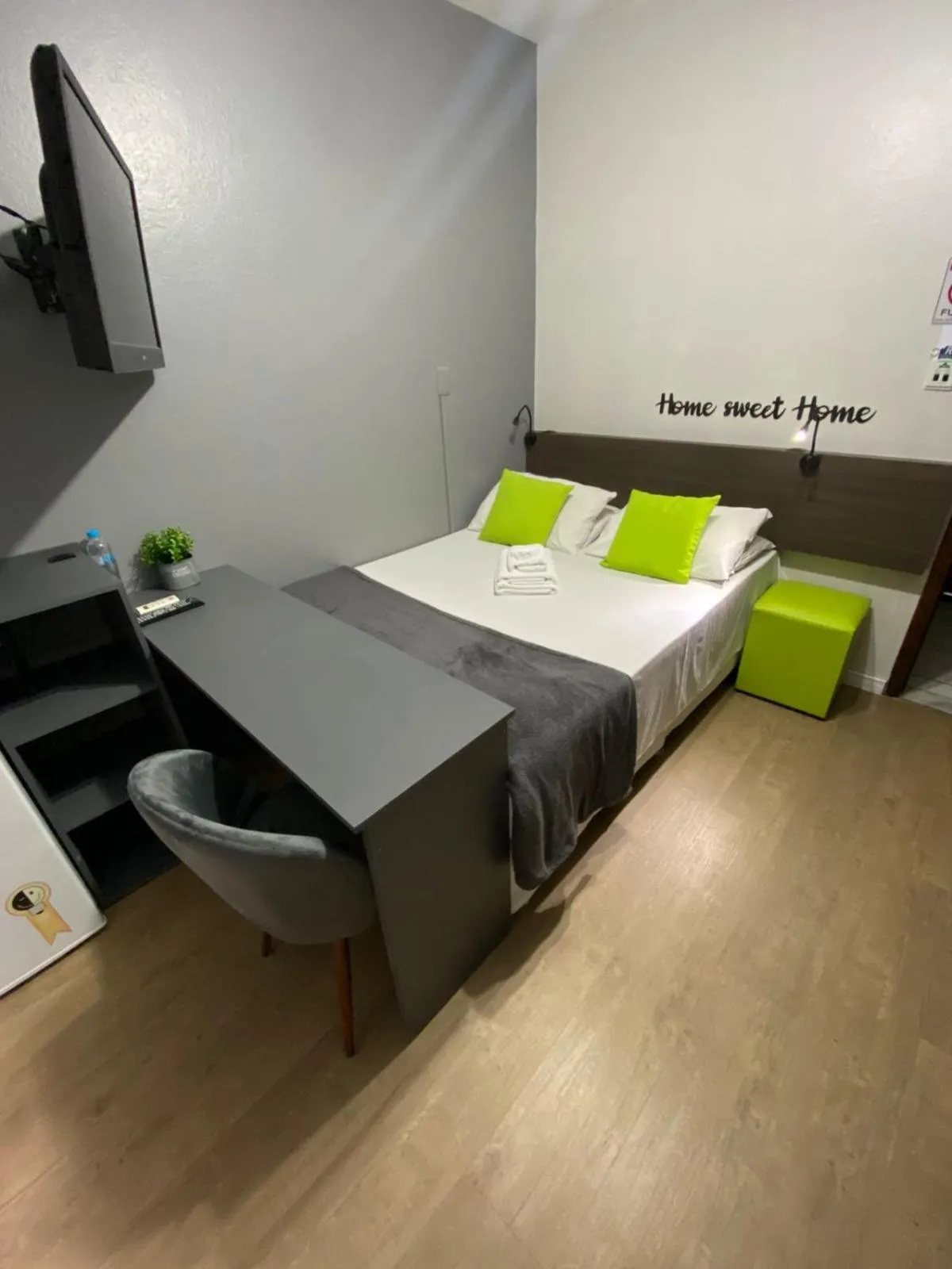 Bed in Rezende Suítes