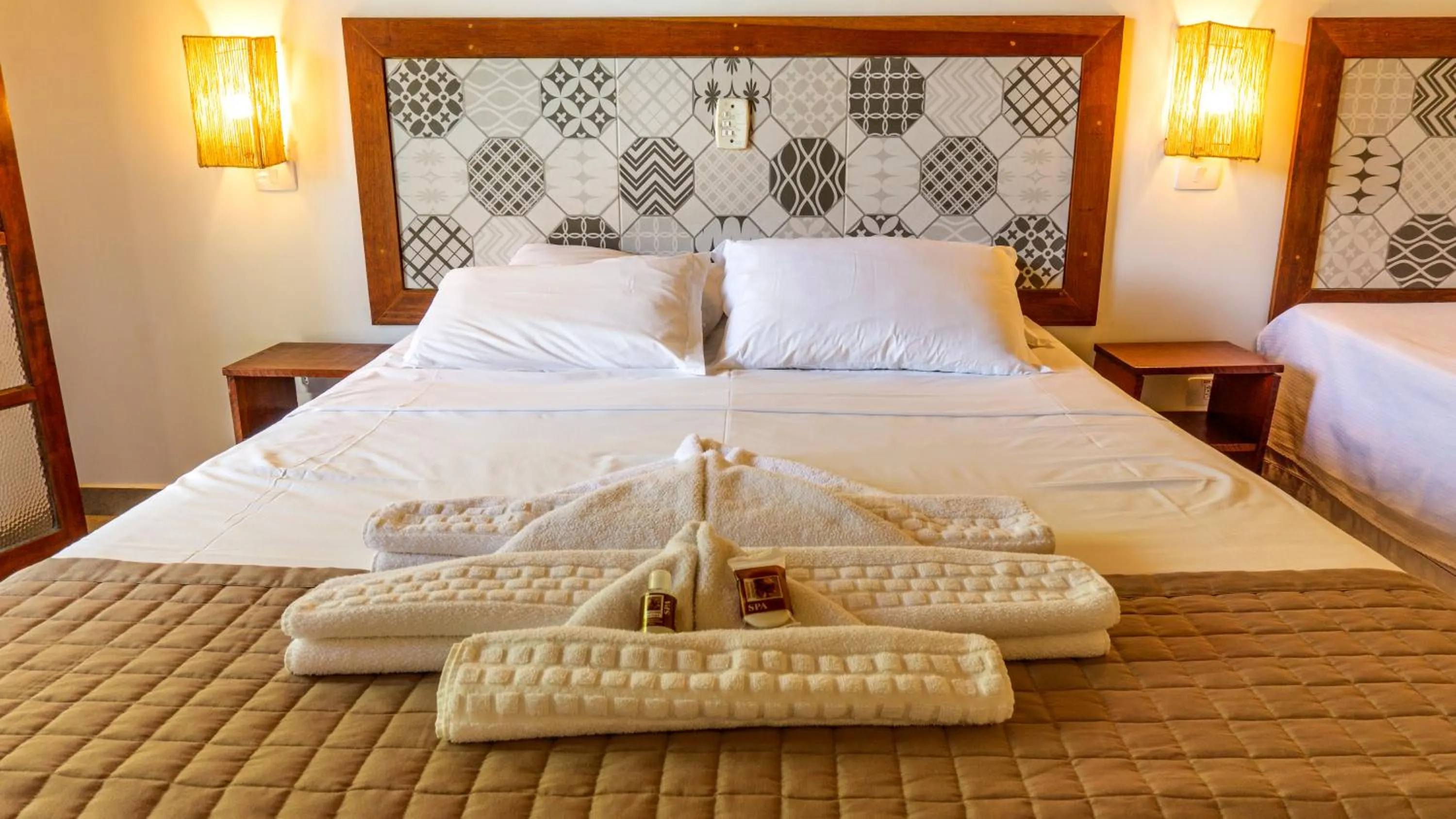 Bed in Pousada Casarão