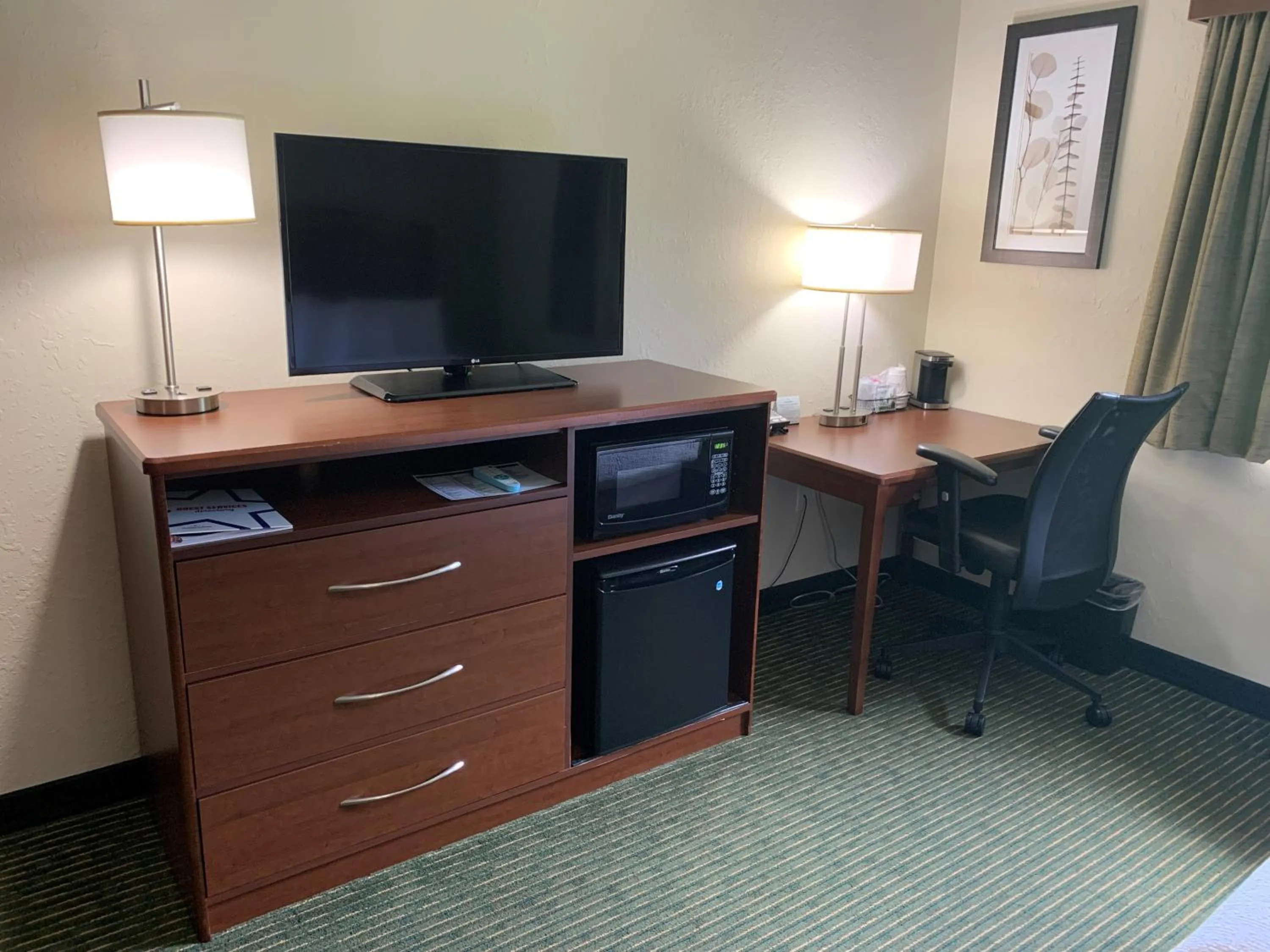 TV and multimedia in AmericInn by Wyndham Ironwood