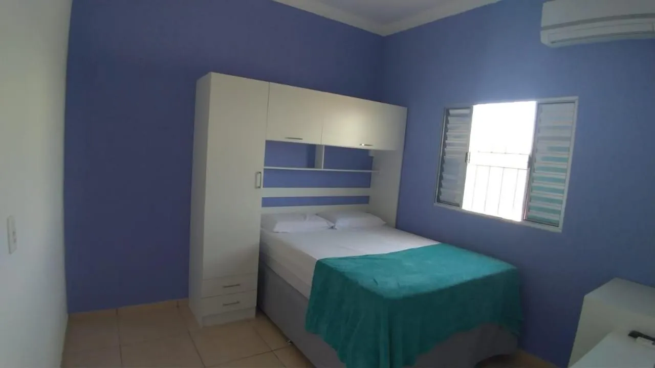 Bed in Pousada Lirio dos Vales