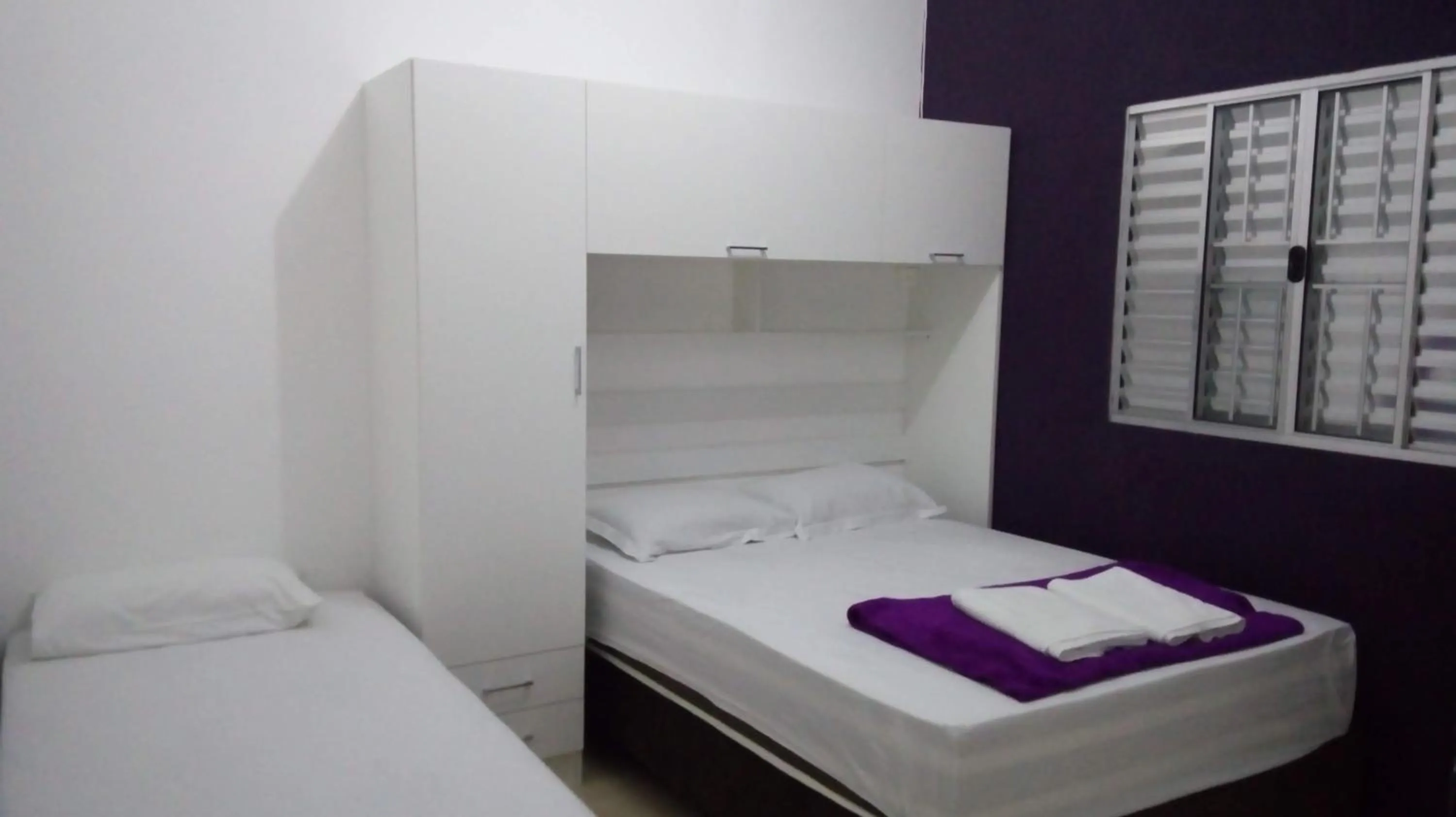 Bed in Pousada Lirio dos Vales