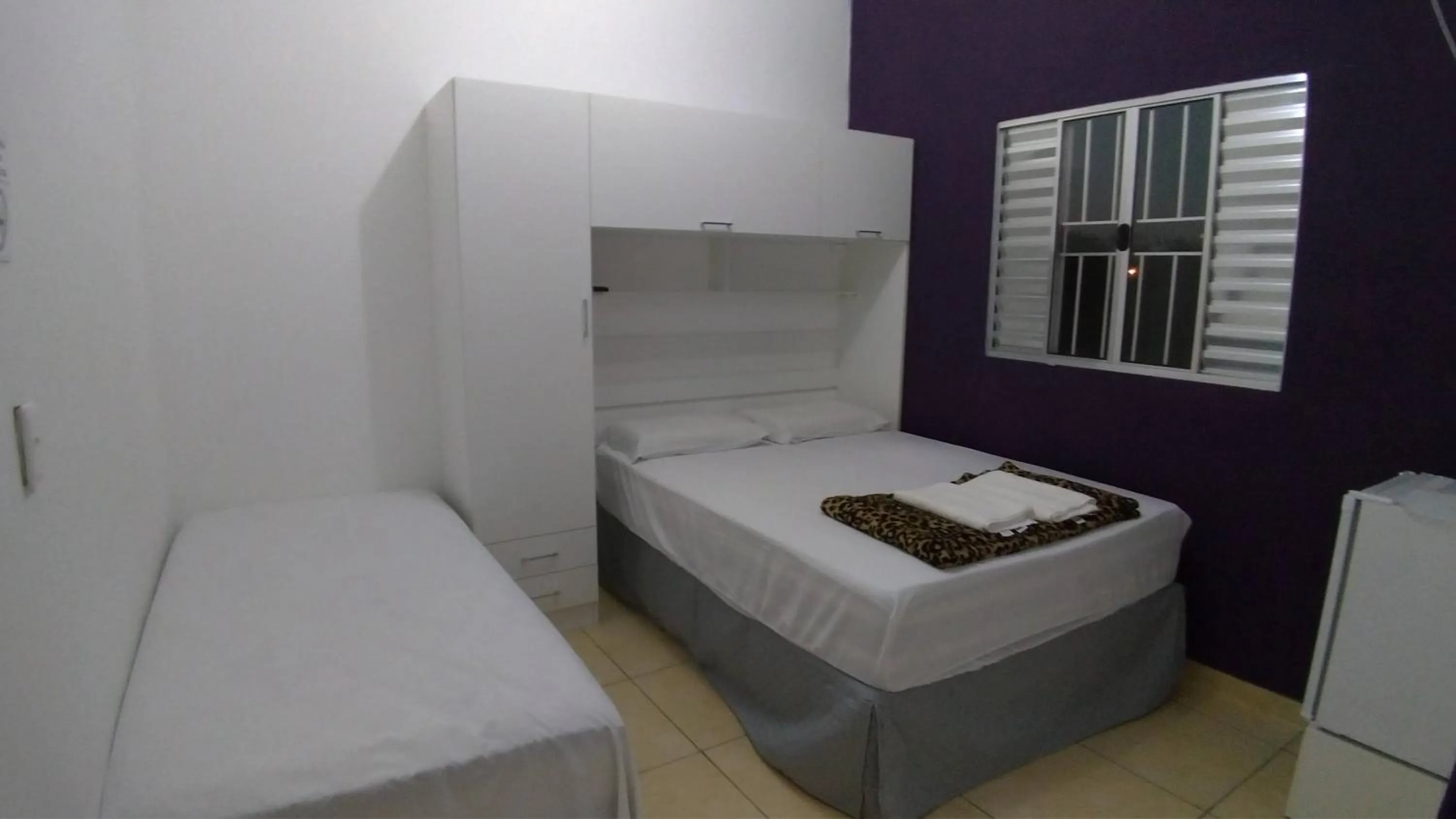 Bed in Pousada Lirio dos Vales