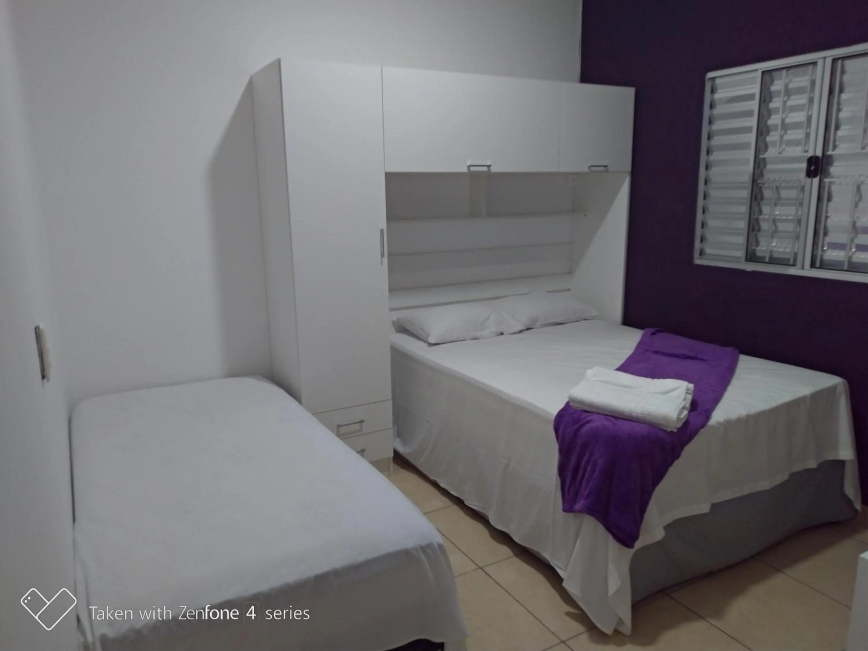 Bed in Pousada Lirio dos Vales