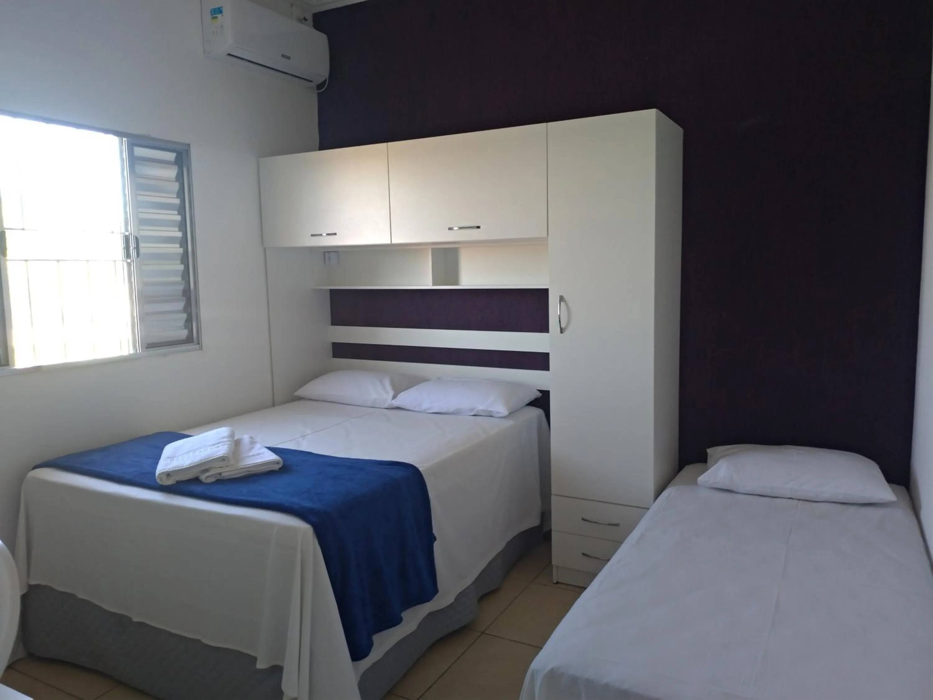 Bed in Pousada Lirio dos Vales