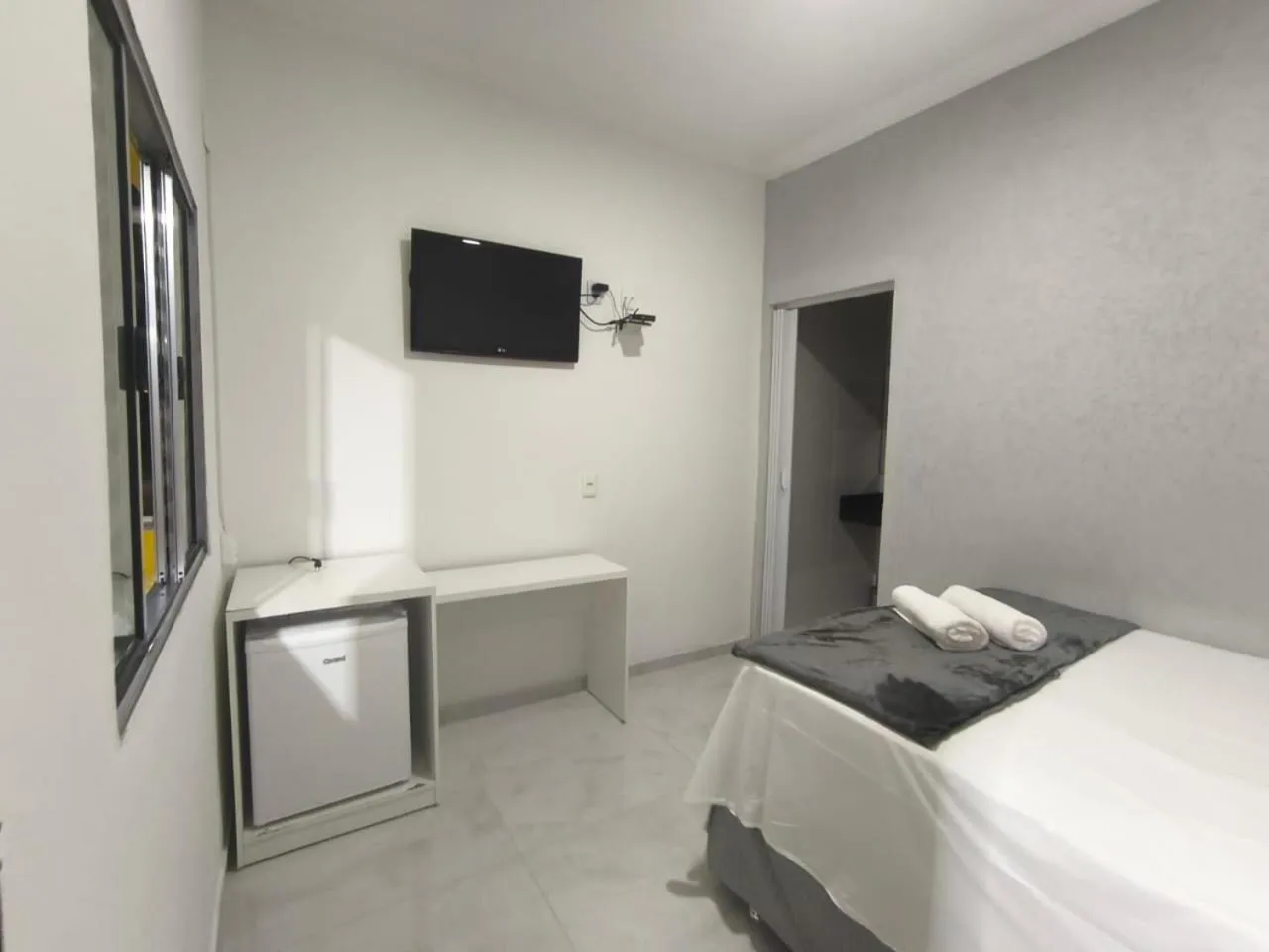 Bed in Pousada Lirio dos Vales