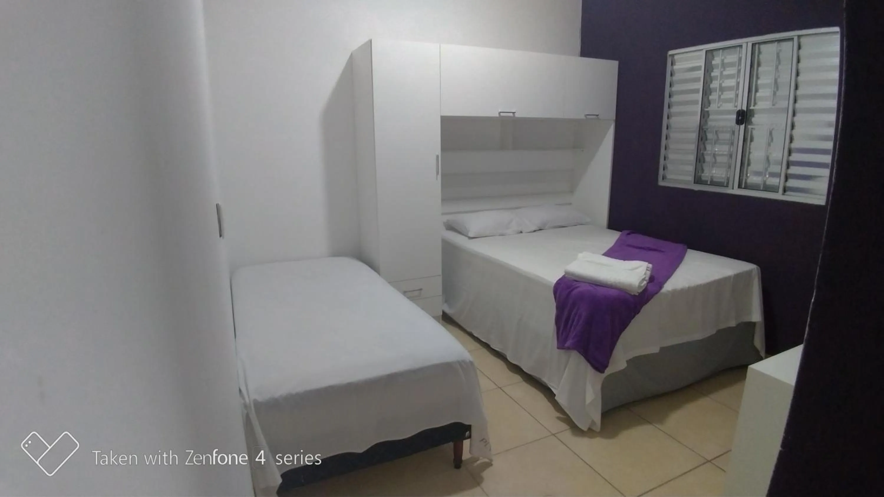 Bed in Pousada Lirio dos Vales