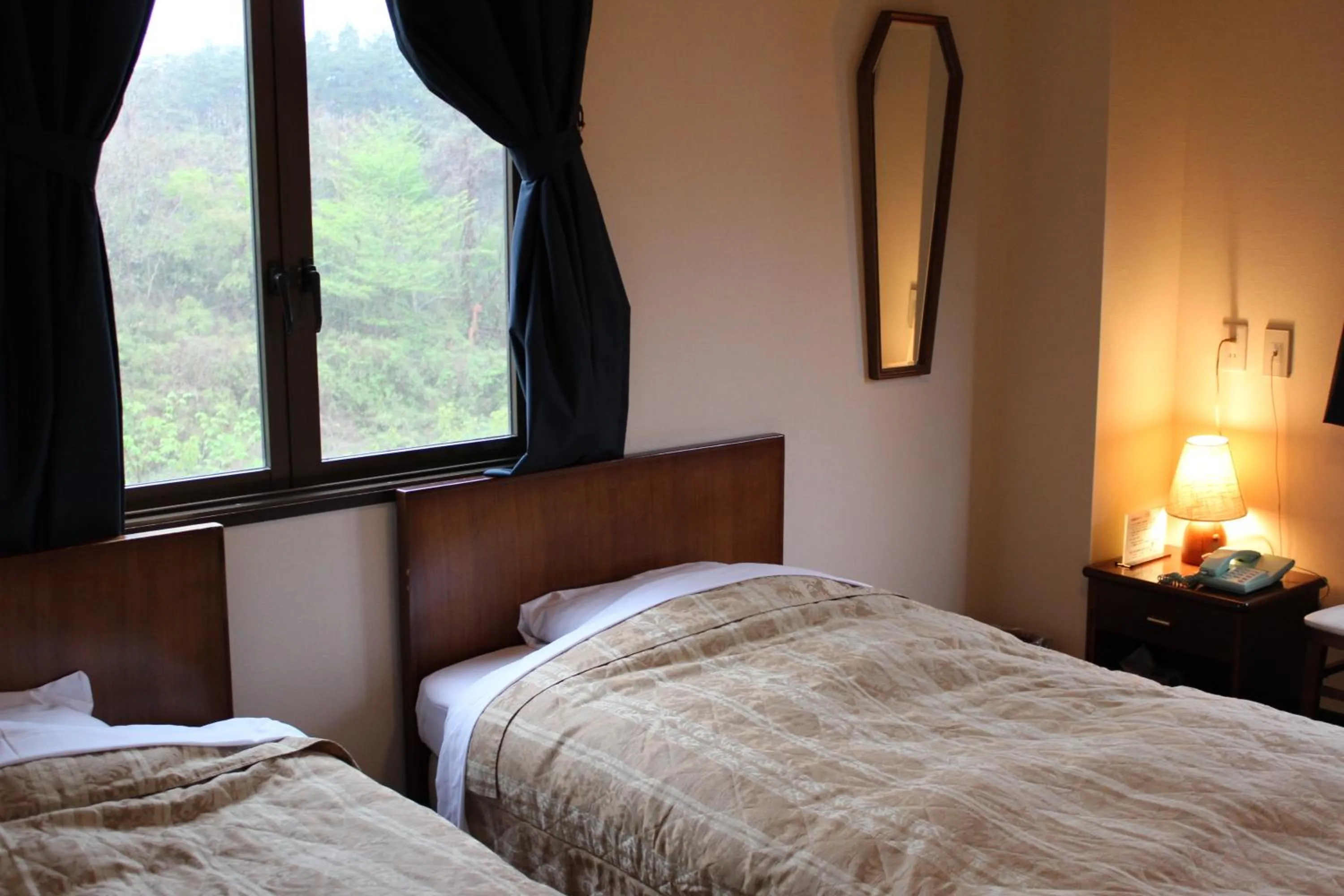 Bed in Matsushima Petit Hotel Bistro Abalon