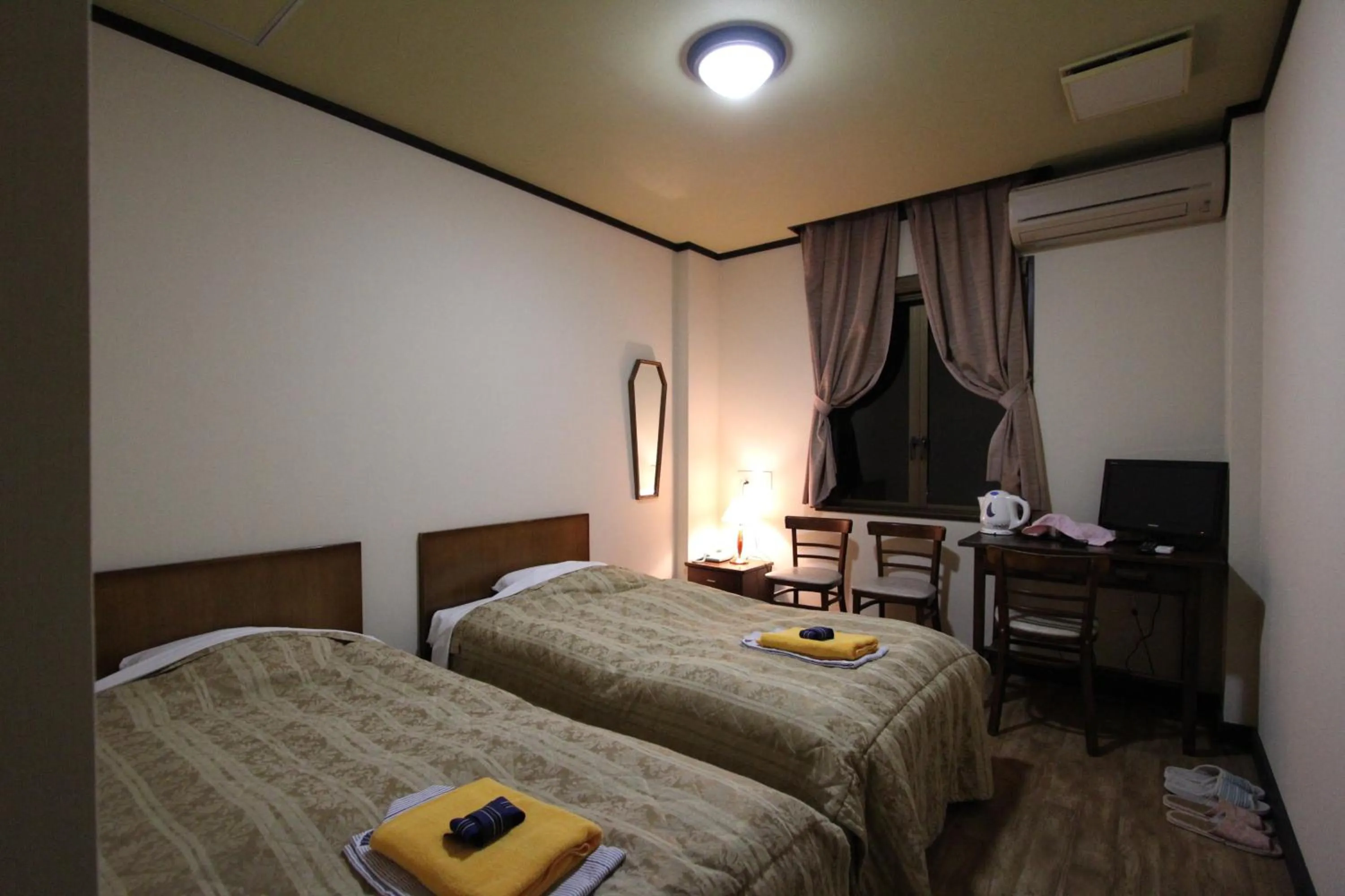 Photo of the whole room, Bed in Matsushima Petit Hotel Bistro Abalon