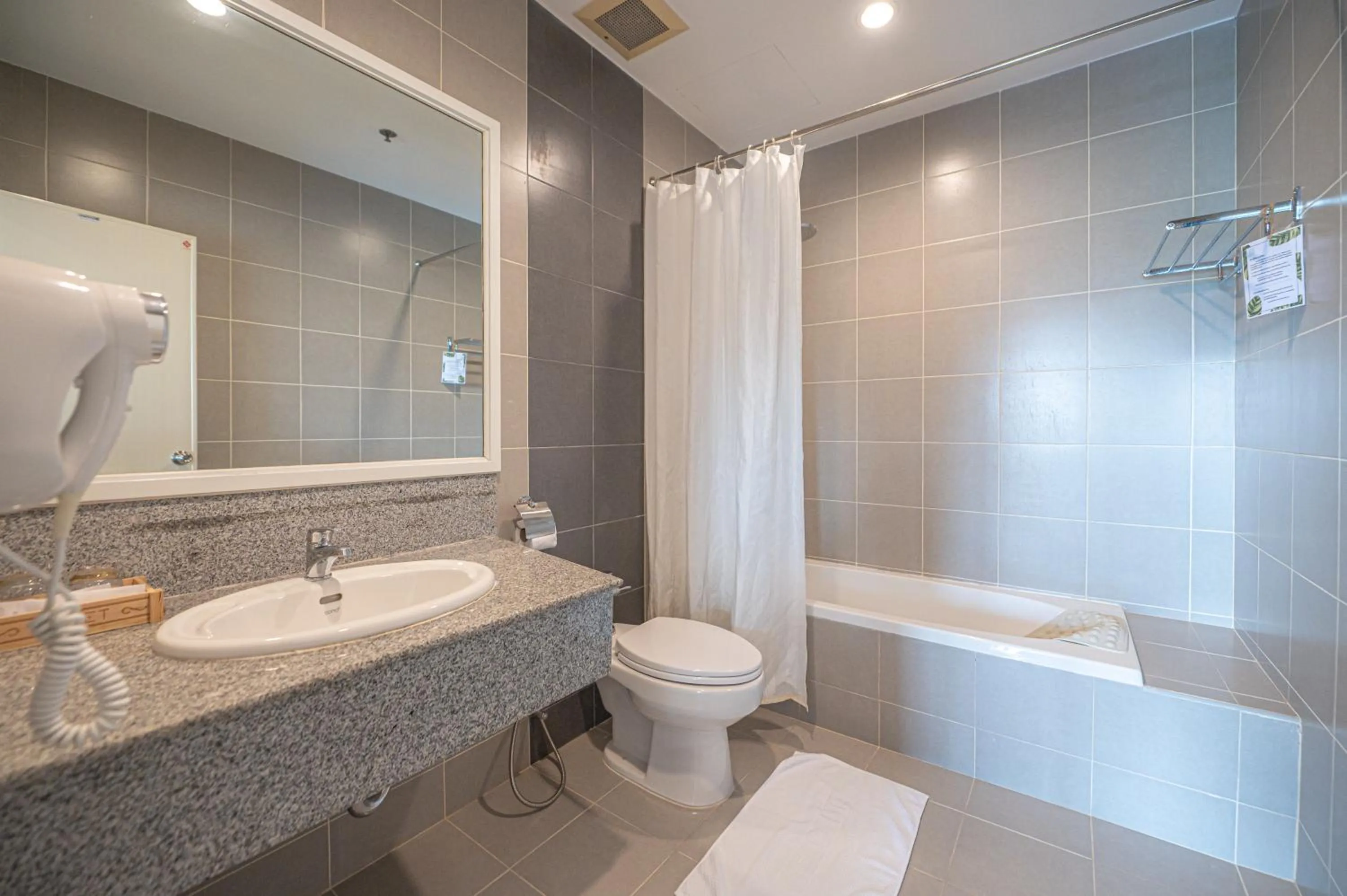 Shower in Eco Hotel by Thammasat