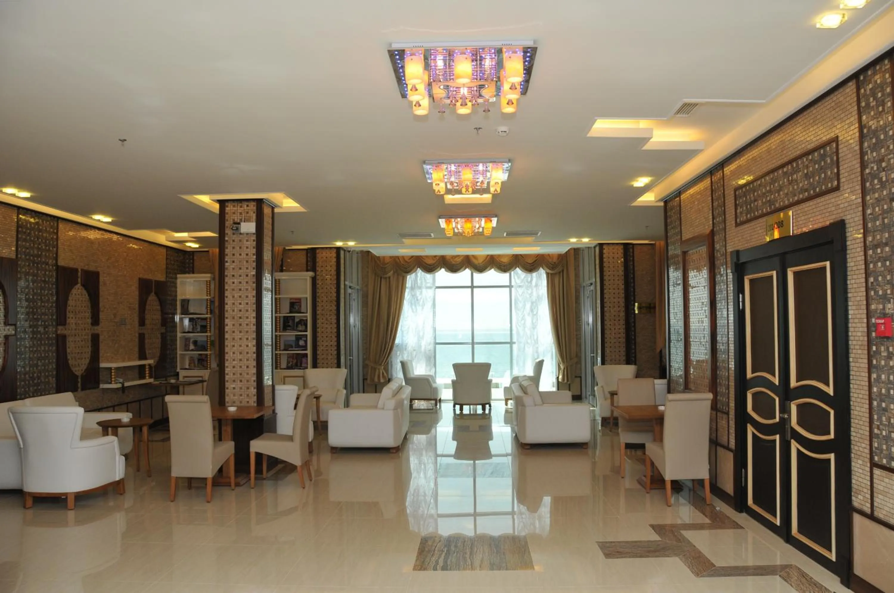 Communal lounge/ TV room in Aysberq Resort