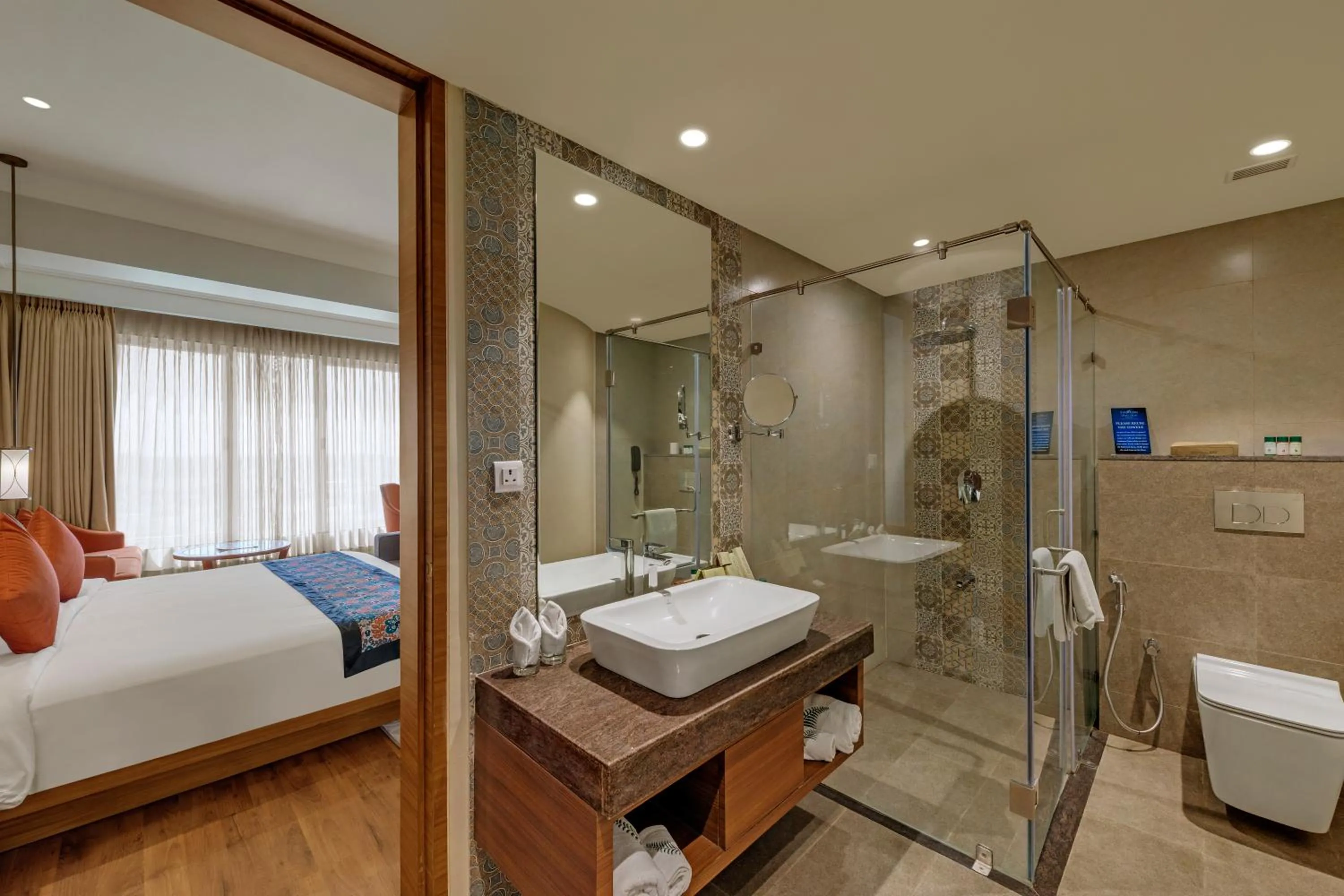 Shower, Bed in The Fern Sattva Resort, Dwarka
